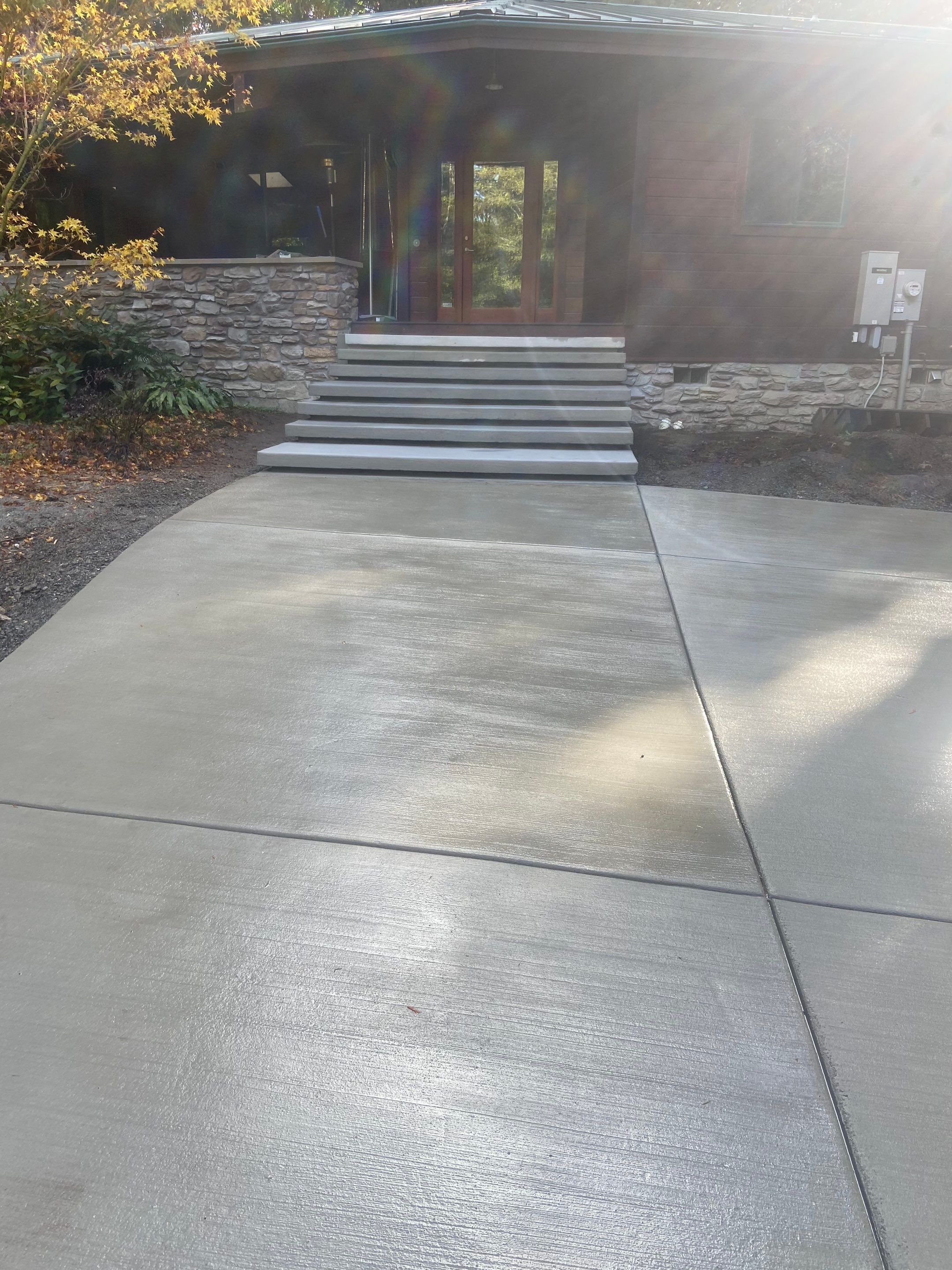 Pia | Custom Concrete Driveway, Walkway & Floating Steps by Jireh Asphalt & Concrete Inc 