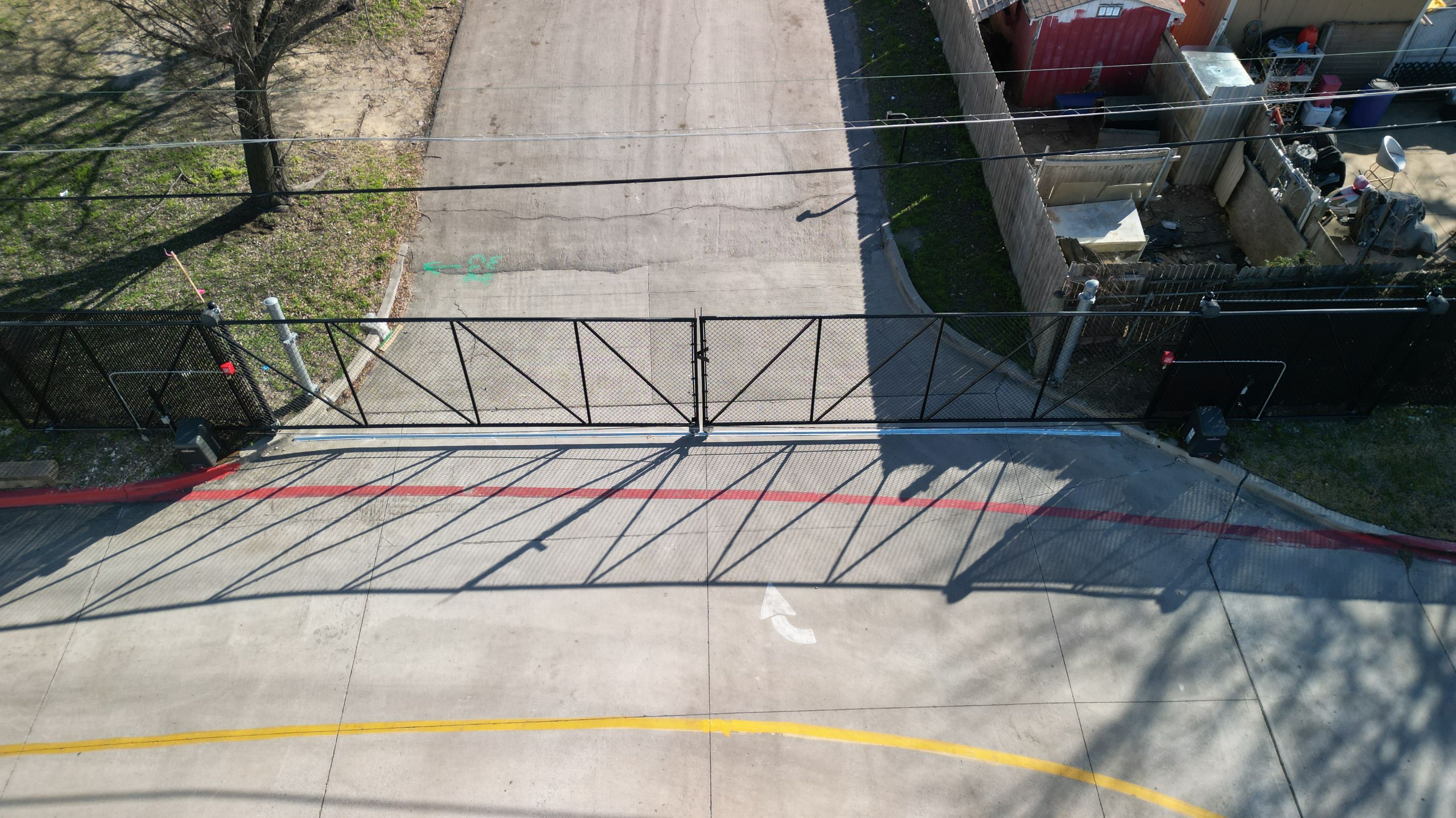 Commercial Fencing - Black vinyl coated Chain link Fence by 3:16 Roofing and Construction