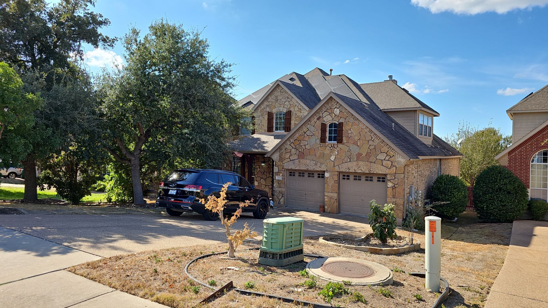 Residential Roof Replacement using Owens Corning - Duration - Desert Rose by Action Exteriors Austin