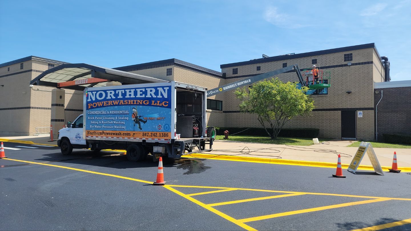 commercial pressure washing using Algaecide, soft wash soap by Northern Power Washing LLC.