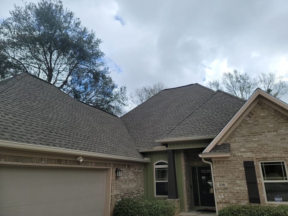 Residential Roofing Installation using Roof Replacement by American Roofing & Construction LLC