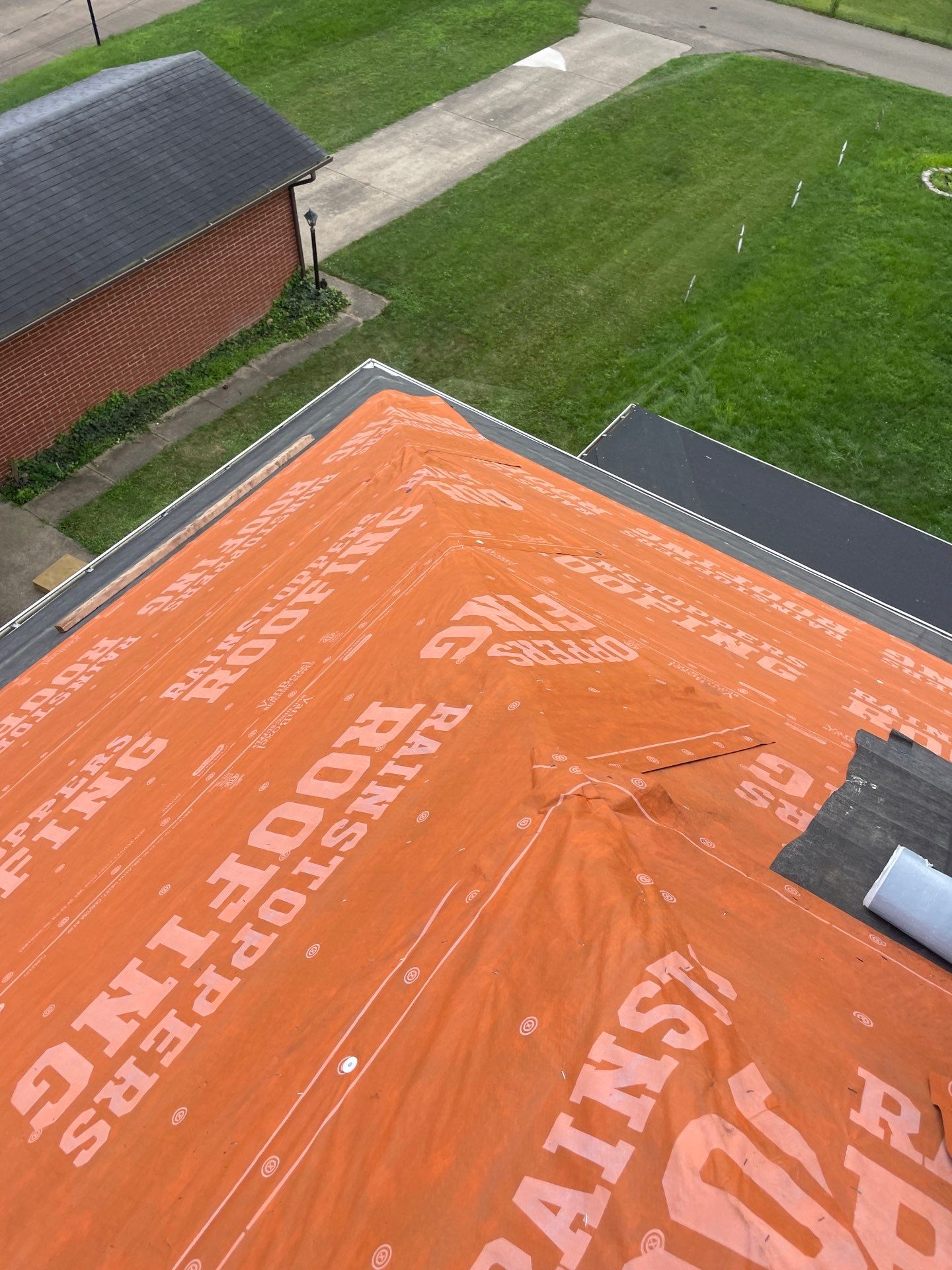 Residential Roofing Installation using GAF Timberline HDZ Charcoal by Rainstoppers Roofing