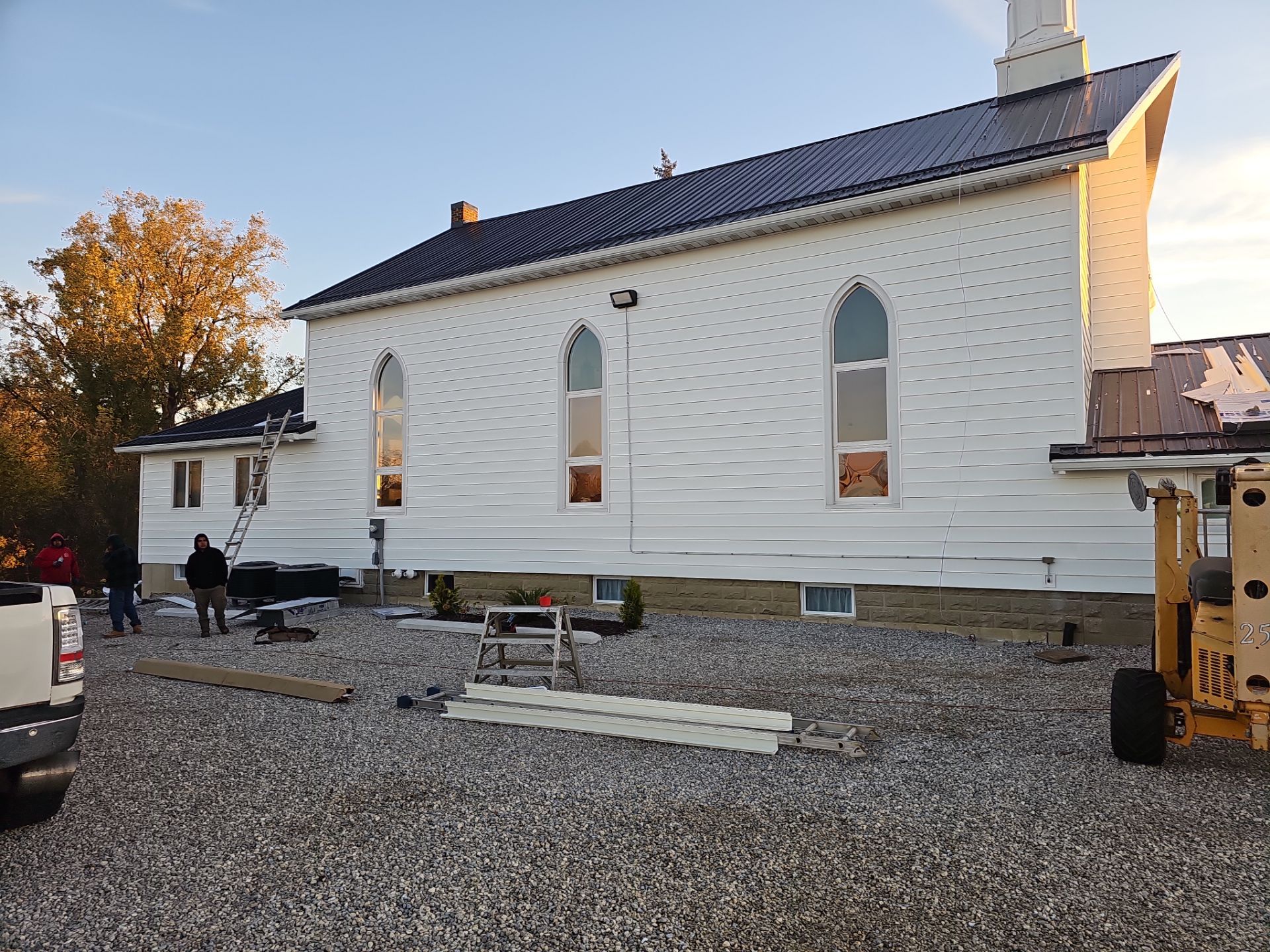 Siding Installation using Mastic 8" white  by Nitro Roofing and Construction