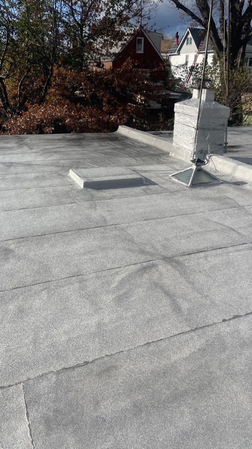 Flat Roof Cleanup and gutter cleaning.  by Above All Gutters 