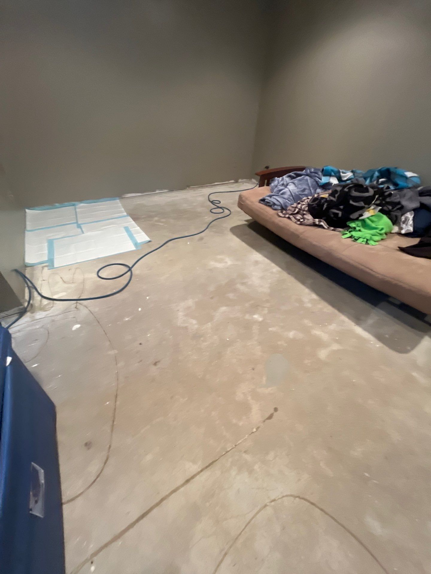 Custom Multi-Fleck Epoxy Floor Coating for Residential Basement by Select Painting, Coatings & Garage Cabinets