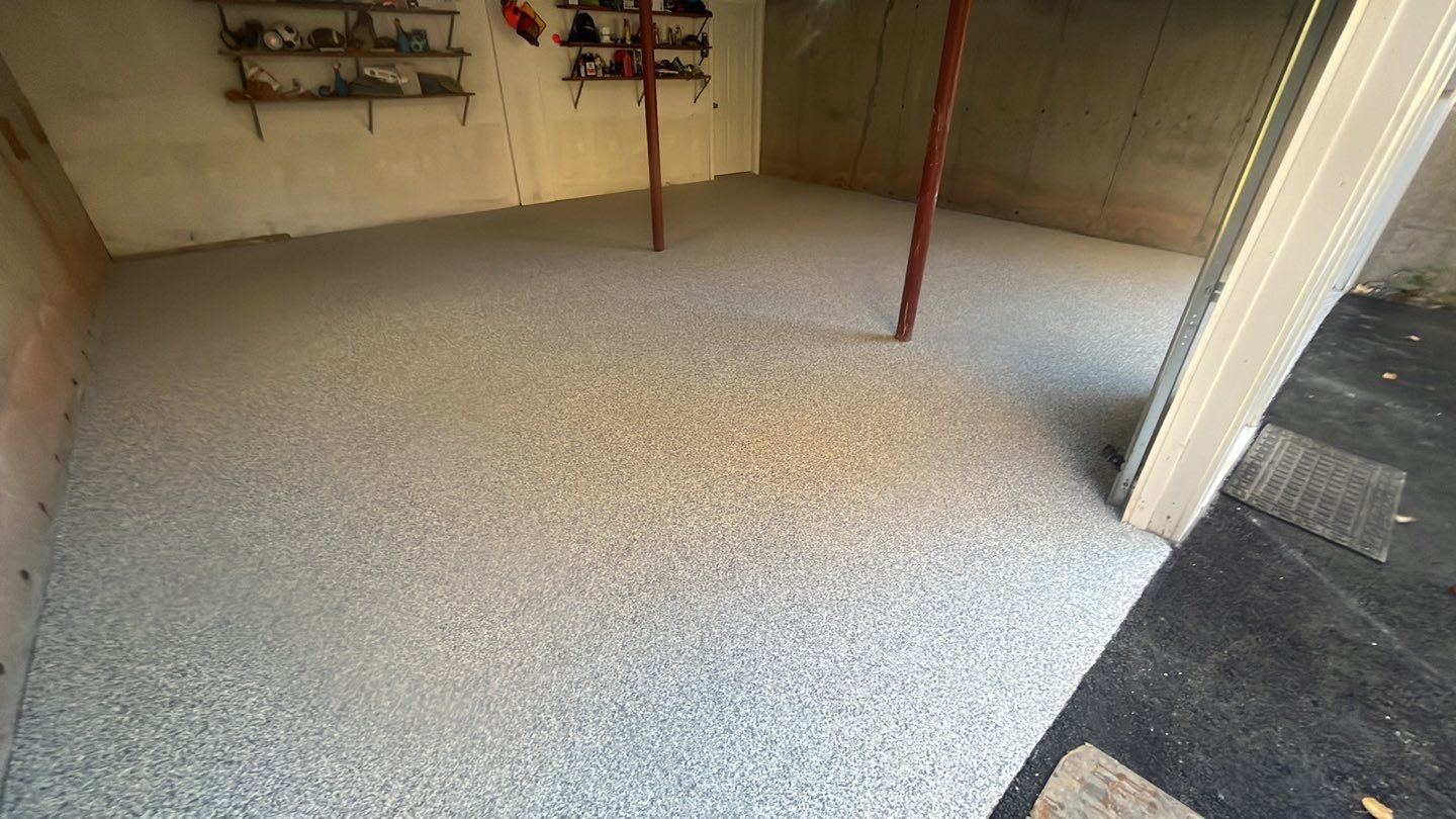 Garage in Londonderry, NH 03053 by Symphony Concrete Coatings