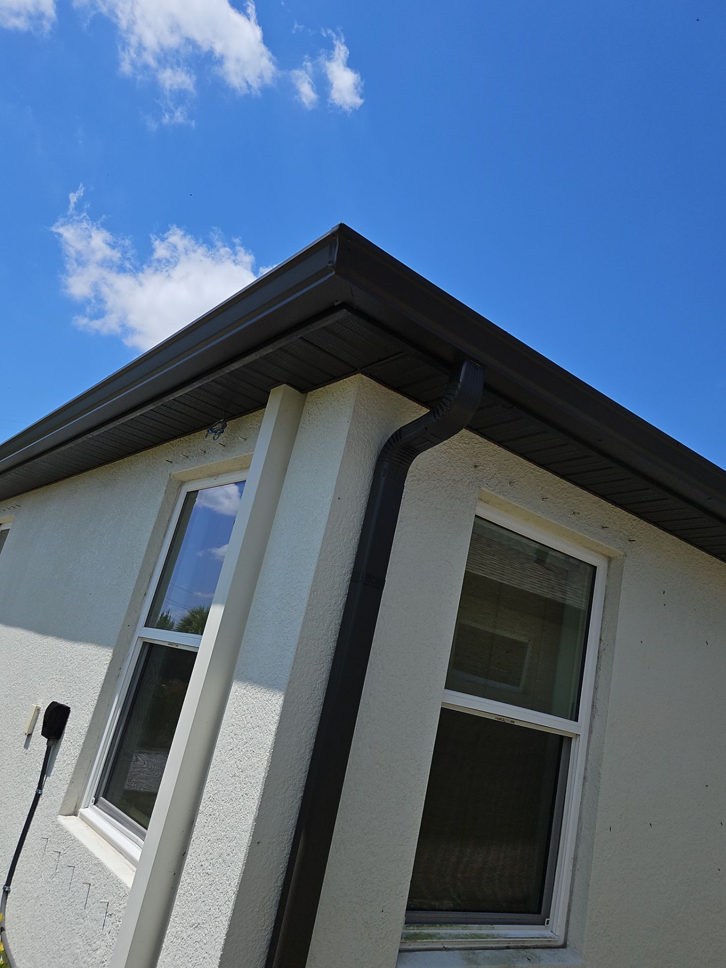 K-Style Seamless Gutter Installation using bronze gutters in Sarasota FL by Gutter Professors