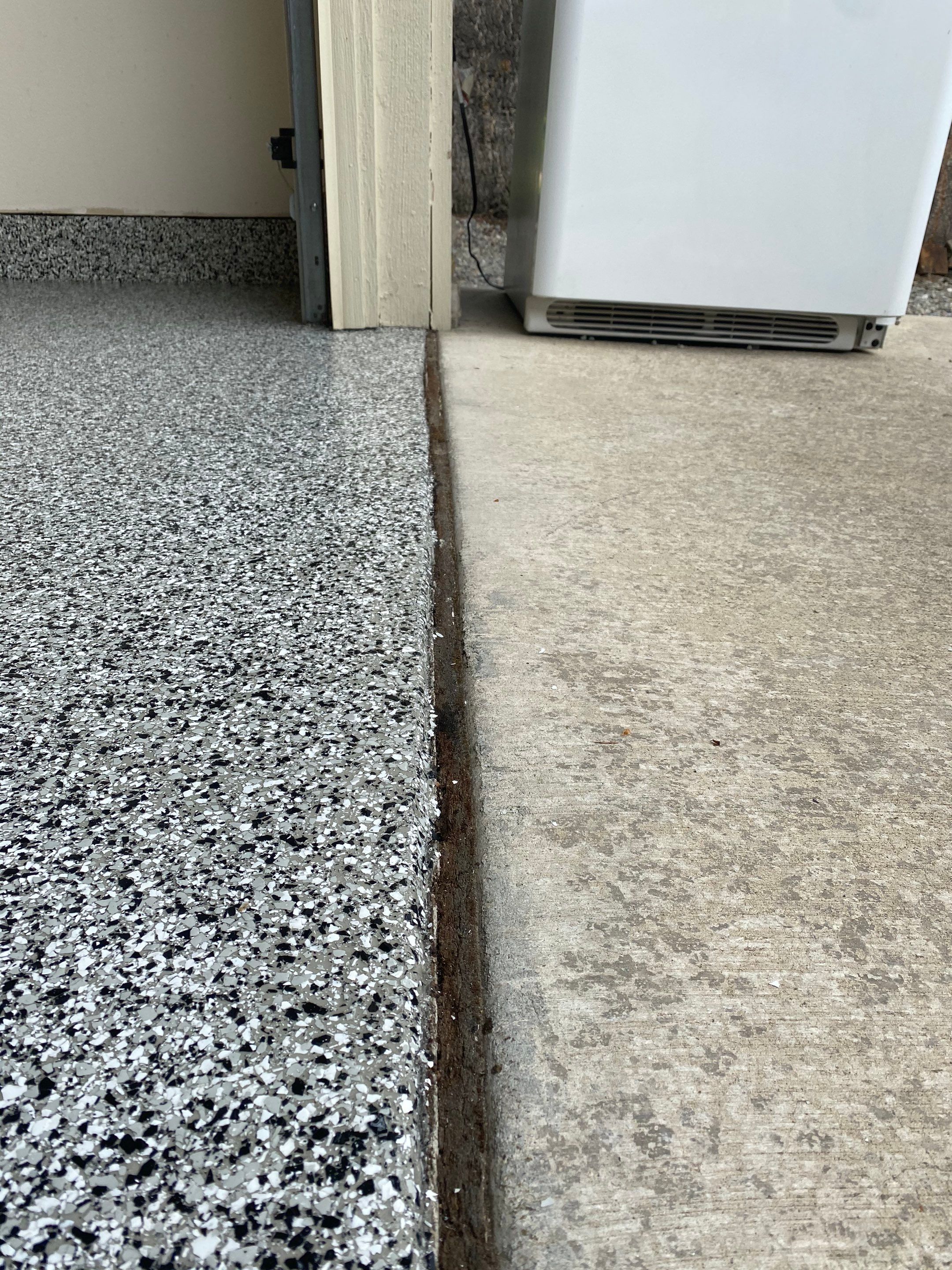 Garage Transformation using Domino by Croc Coatings, LLC