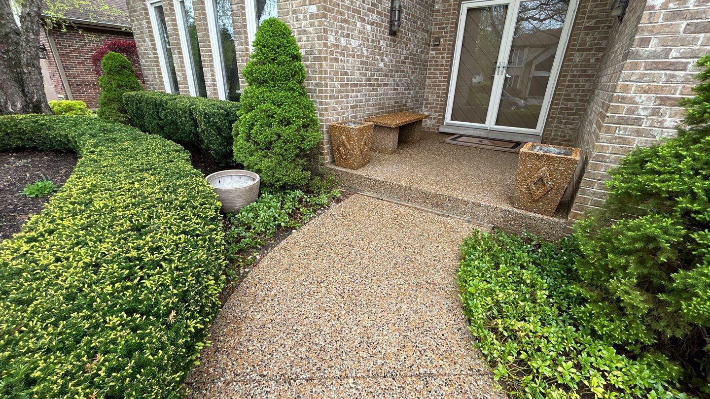 concrete patio and driveway cleaning by Northern Power Washing LLC.
