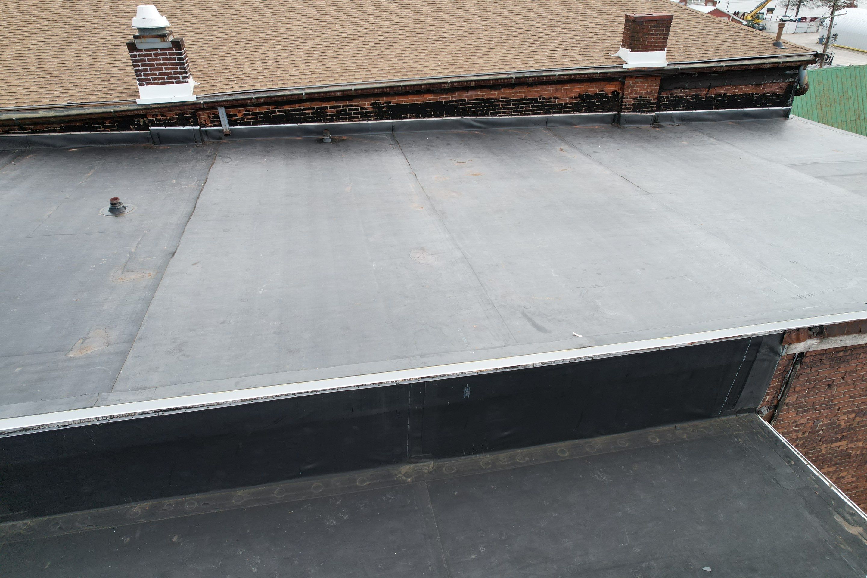 Commercial Roofing Installation using EPDM, GAF Timberline HDZ by Rainstoppers Roofing