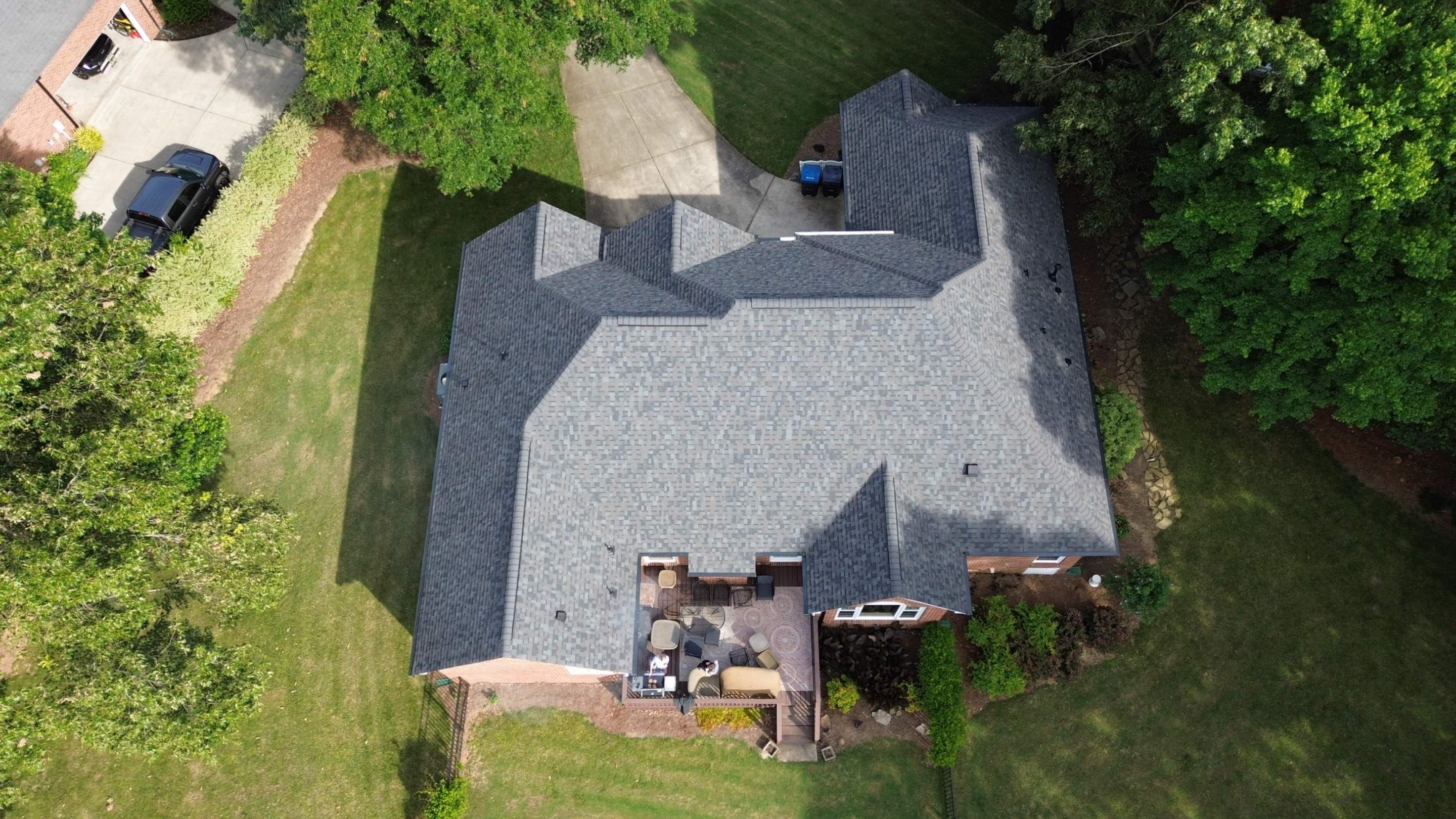 Residential Roof Replacement and Seamless Gutter Installation in Wesley Chapel, NC by Merritt Roofing LLC