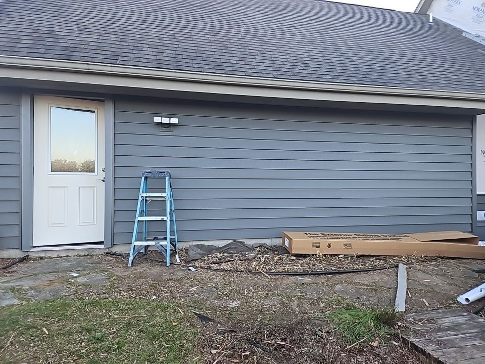 Siding Installation using Norandex Polar Wall Plus Siding, Window Wraps by Total Exteriors