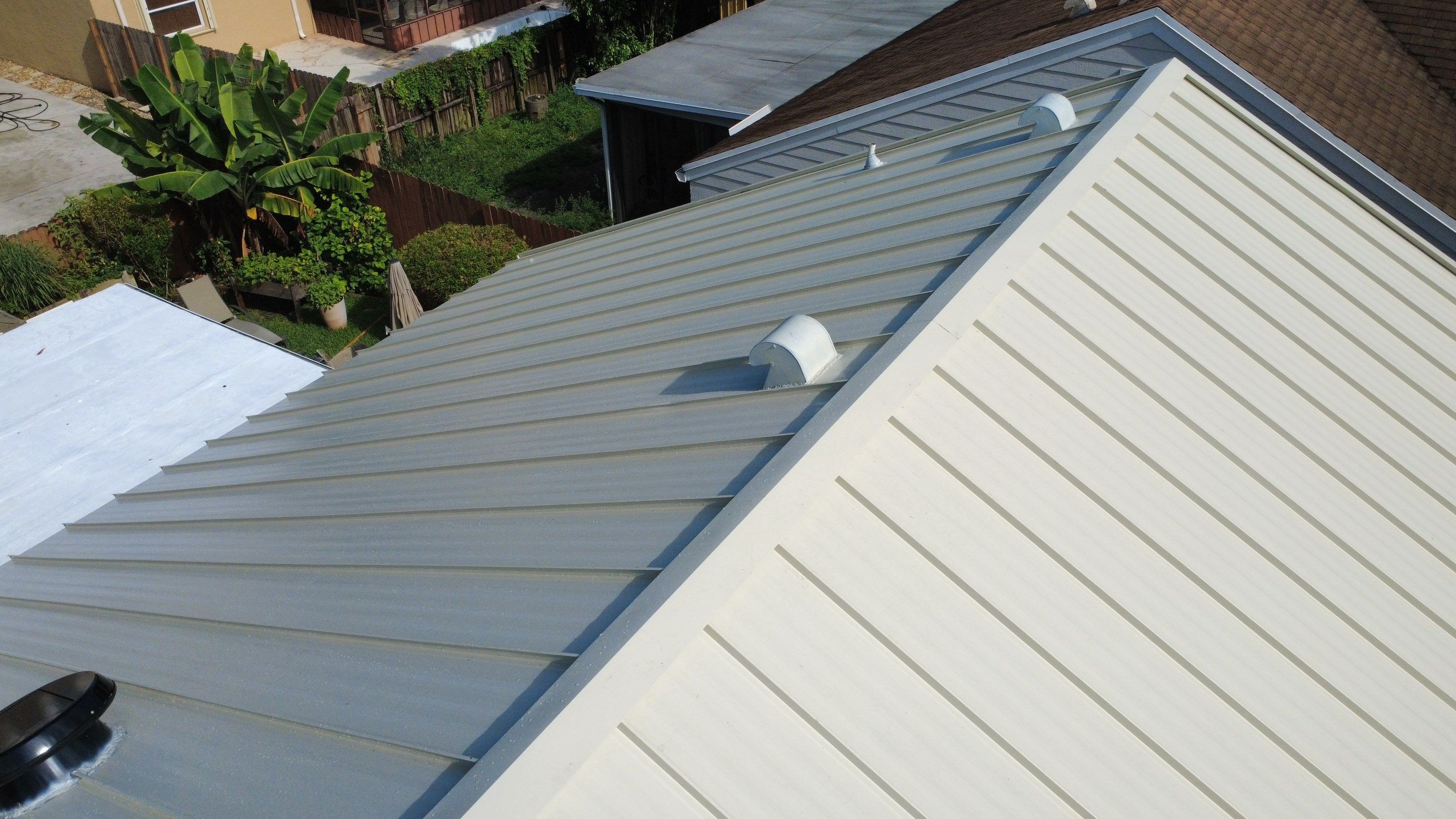 Residential Roofing Installation using 1.5'' Mechanical Seam by BLUES BROTHERS ROOFING