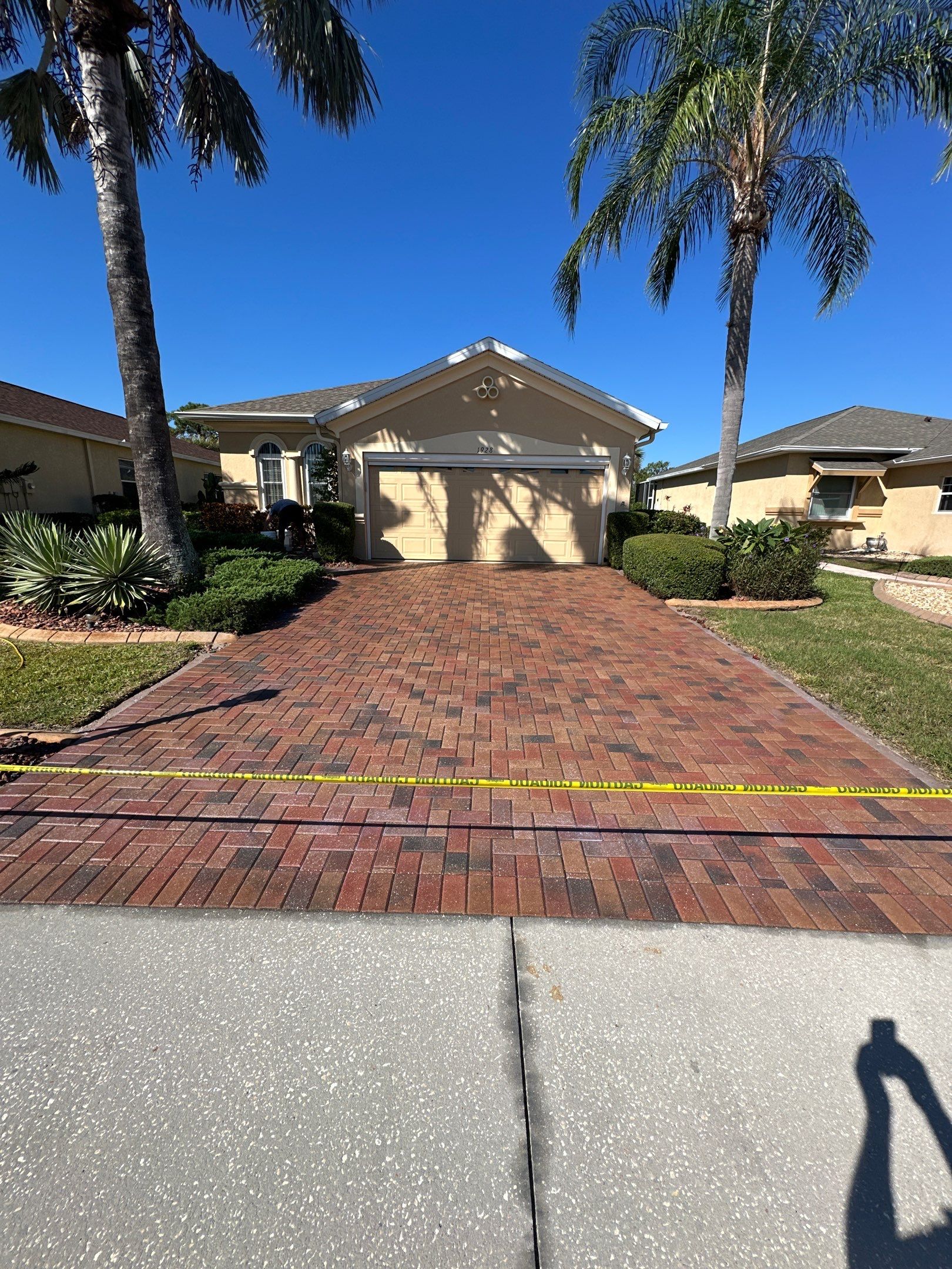 Restoring Multi-Tone Paver Driveway and Walkways in Sun City Center by Supreme Paver Experts