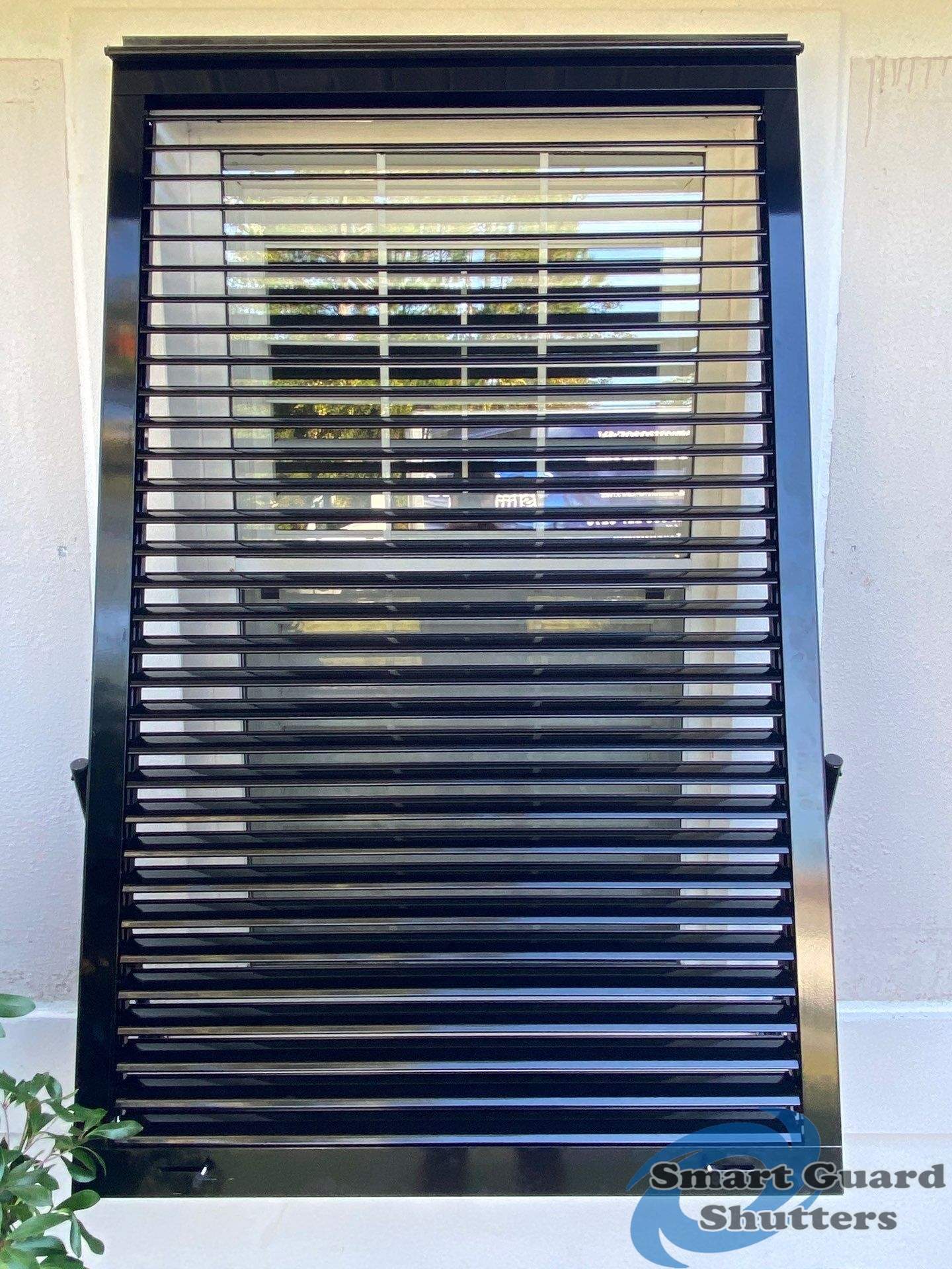 Impact Bahamas in Jet Black by Smart Guard Shutters