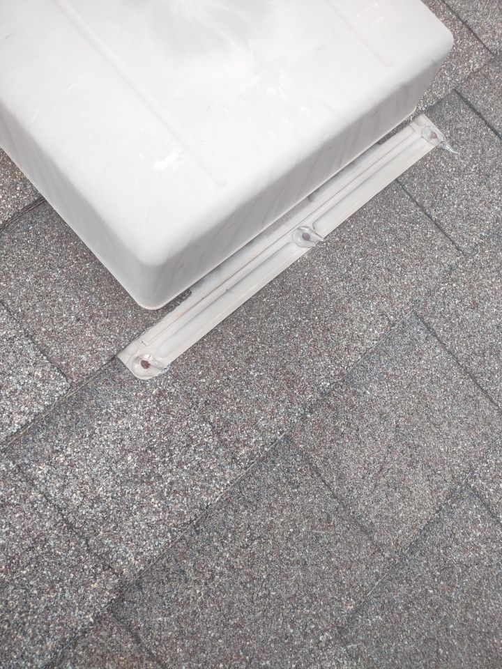 Roof Damage by Bros Roofing