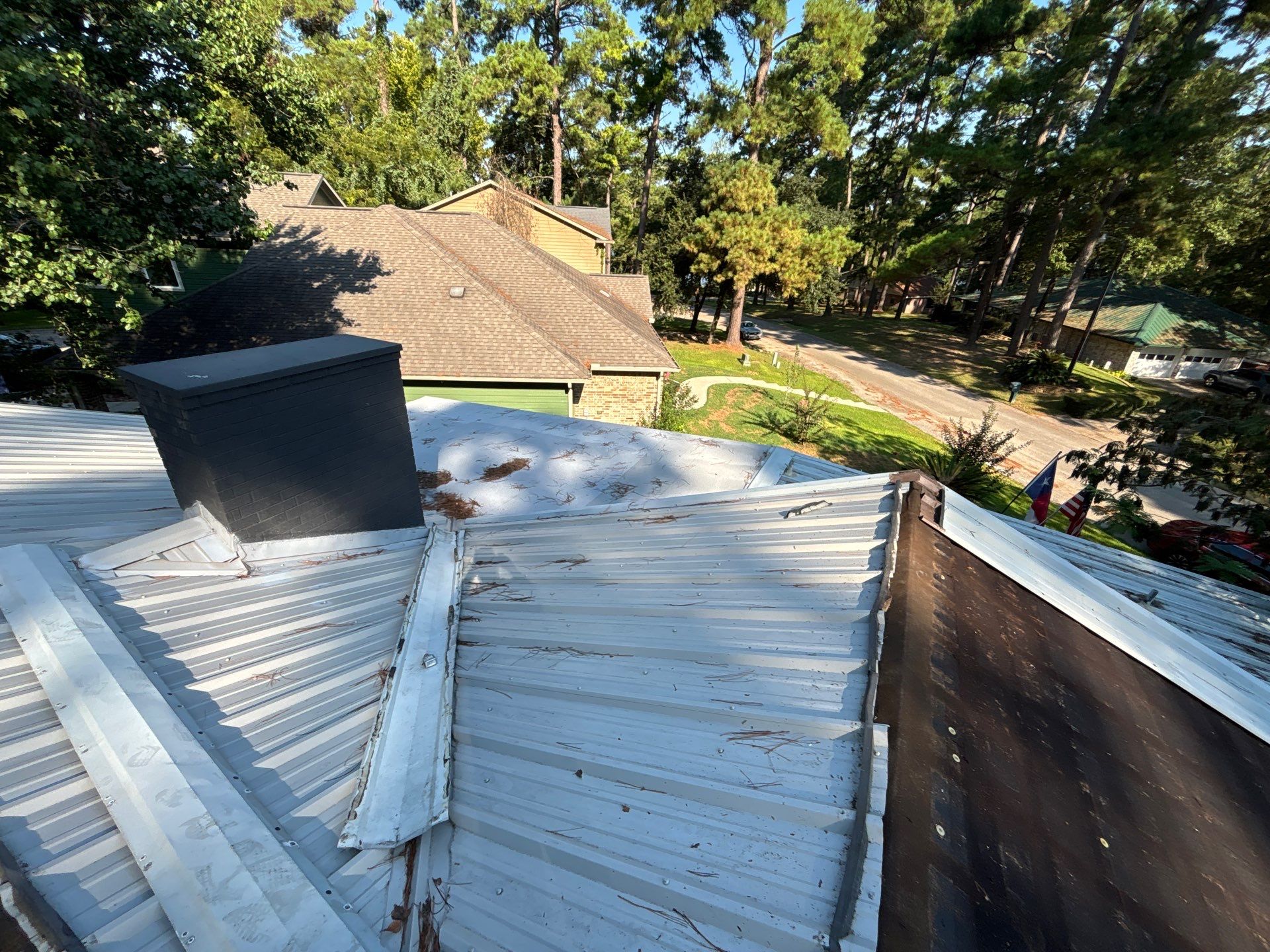 White Standing Seam Metal Roof Replacement in Willis, Texas by Abbott Roofing Company