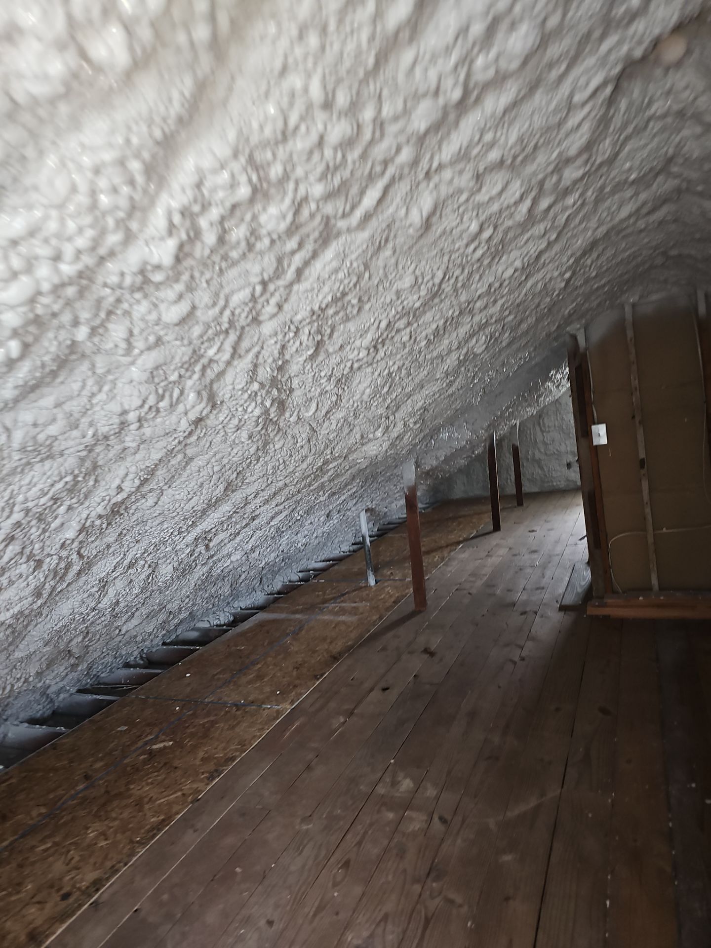 Attic Insulation using open cell spray foam by NYS Foam & Energy