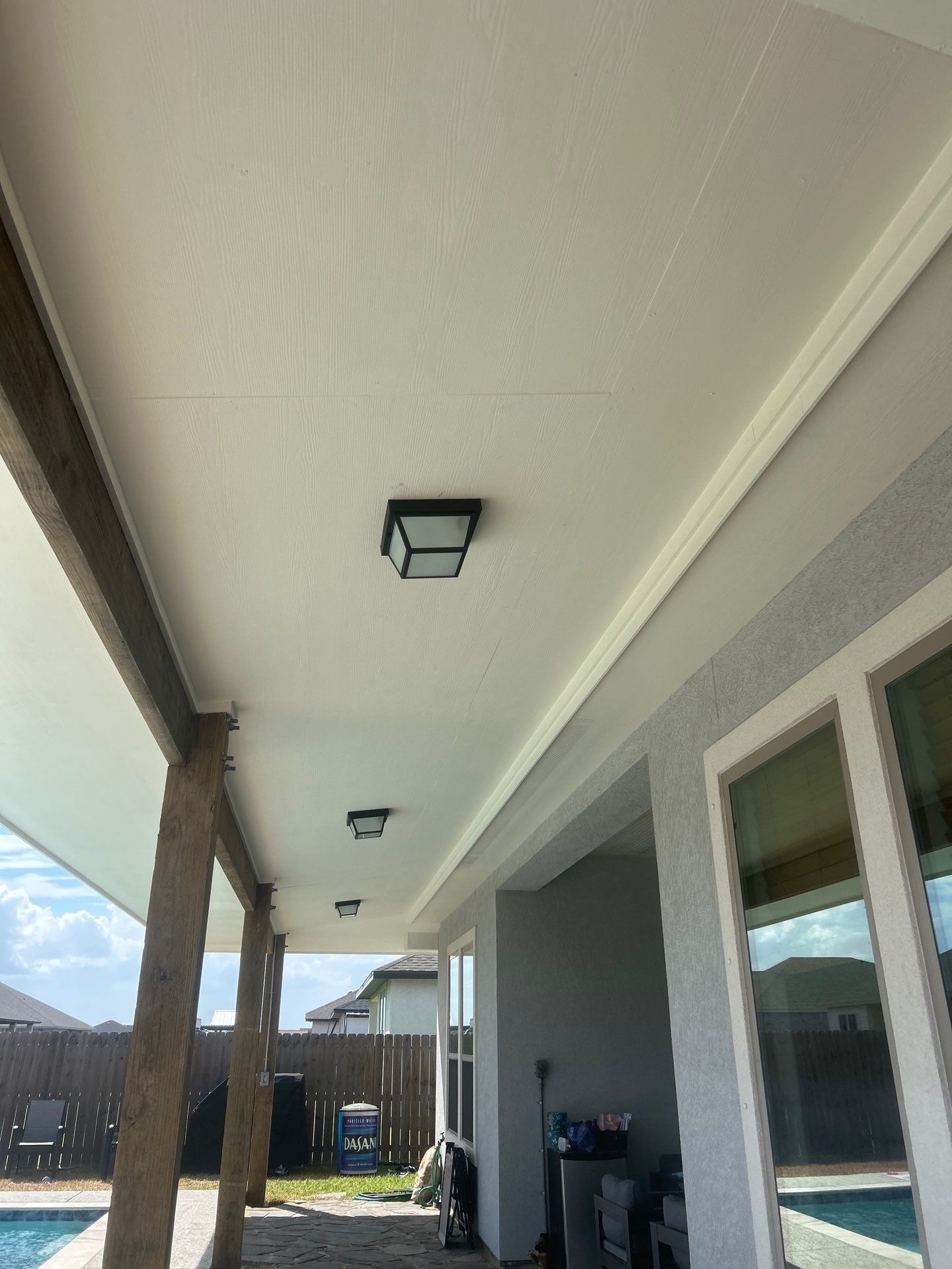 Patio Pool Cover by Bayfront Roofing and Construction