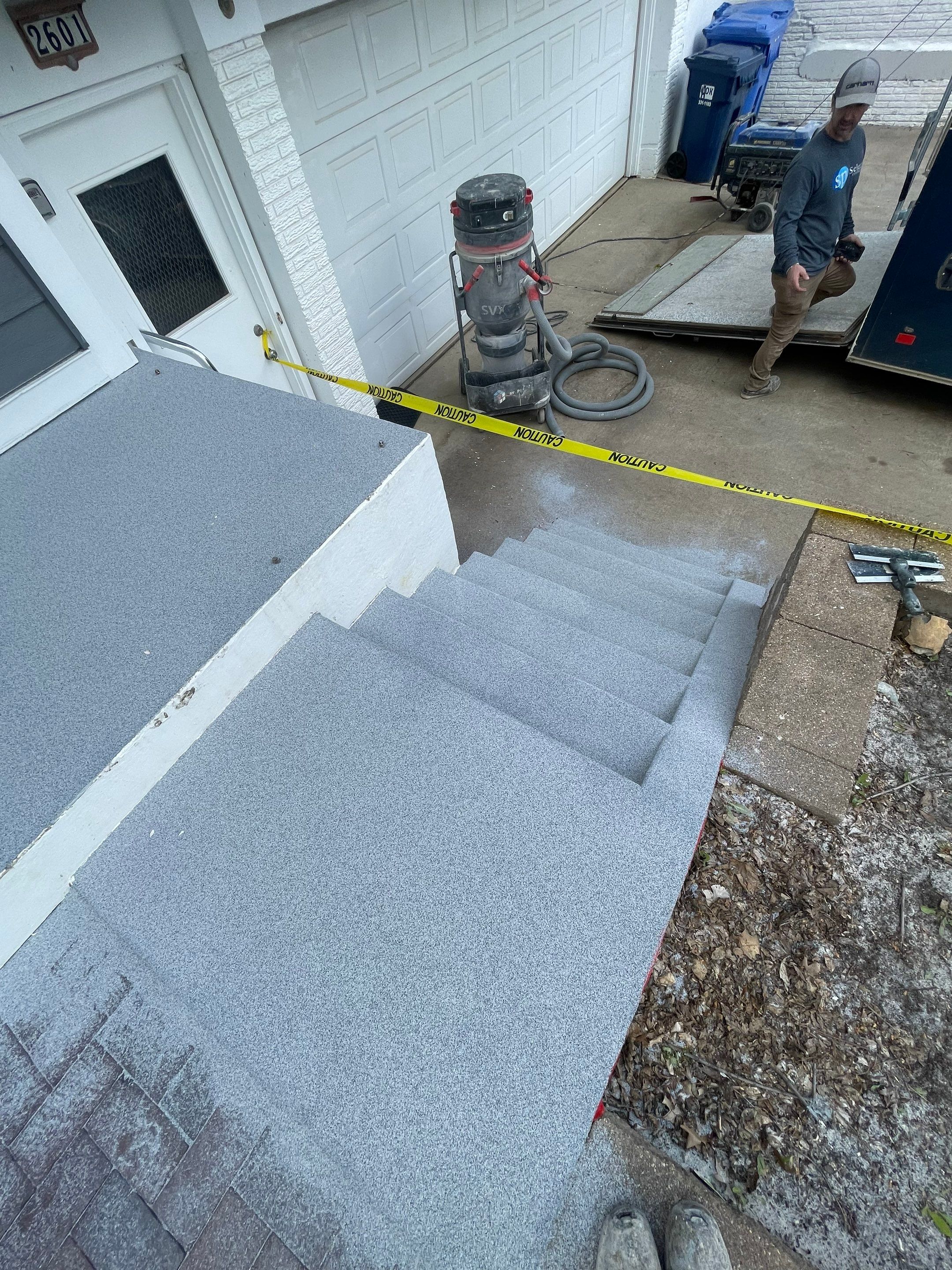 Grey Polyaspartic Porch and Stair Resurfacing in Sioux Falls by Select Painting, Coatings & Garage Cabinets