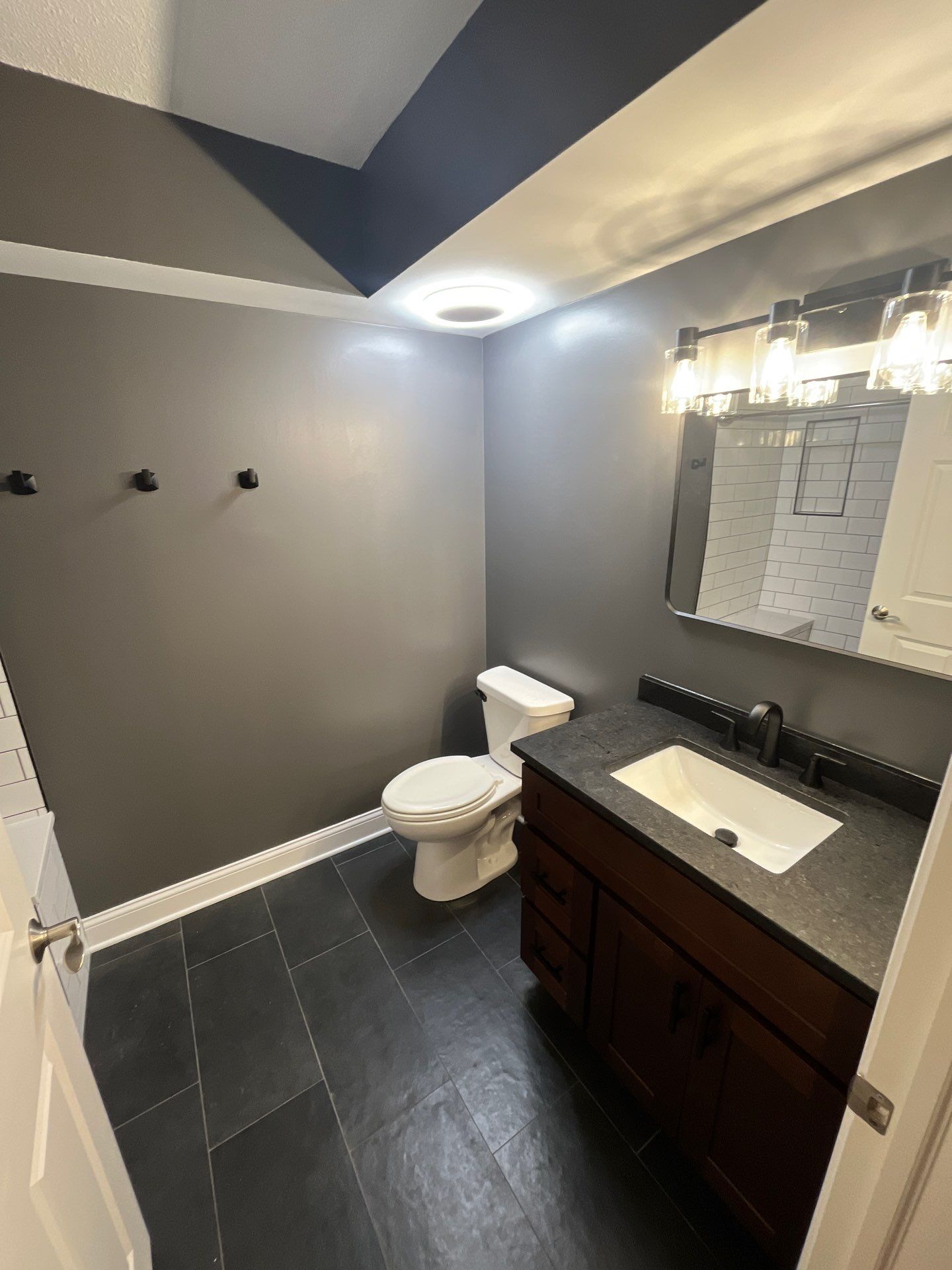 Double Bathroom Makeover by Snap Home Solutions