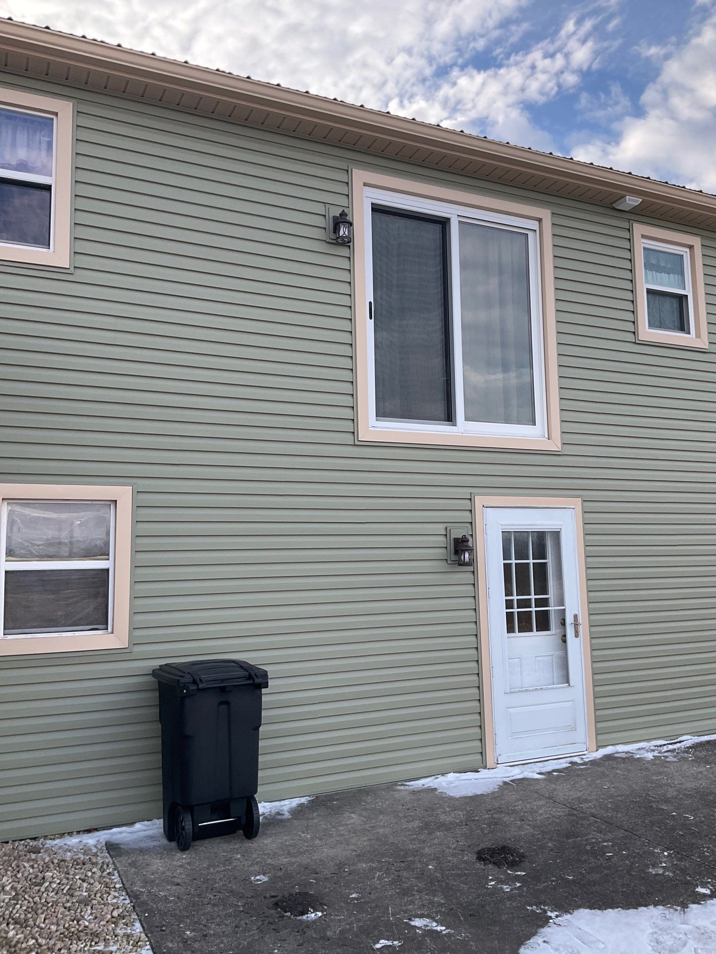 Vinyl Siding Replacement and Patio Door Installation in Elizabethville by Esh Builders