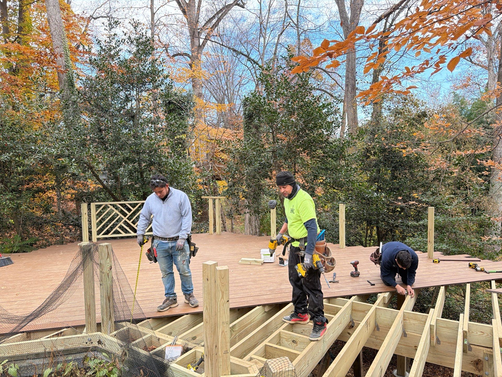 Custom Composite Deck Replacement with Geometric Railing in Bethesda, MD by Jakari Restoration & Construction LLC