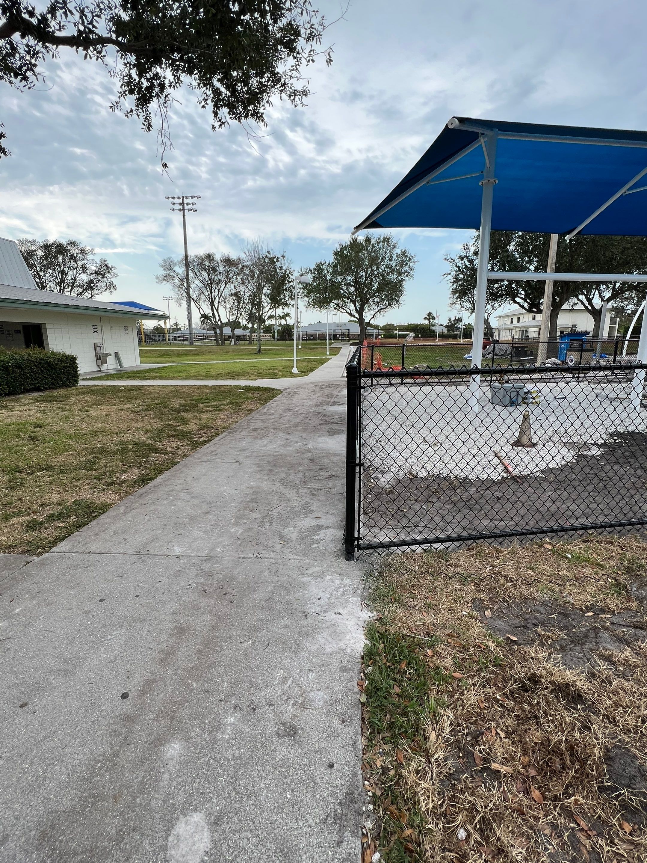Vinyl Coated Chain-link fence for the City of Naples around Fleischmann Park Playground.  by Asap fence and gates, LLC