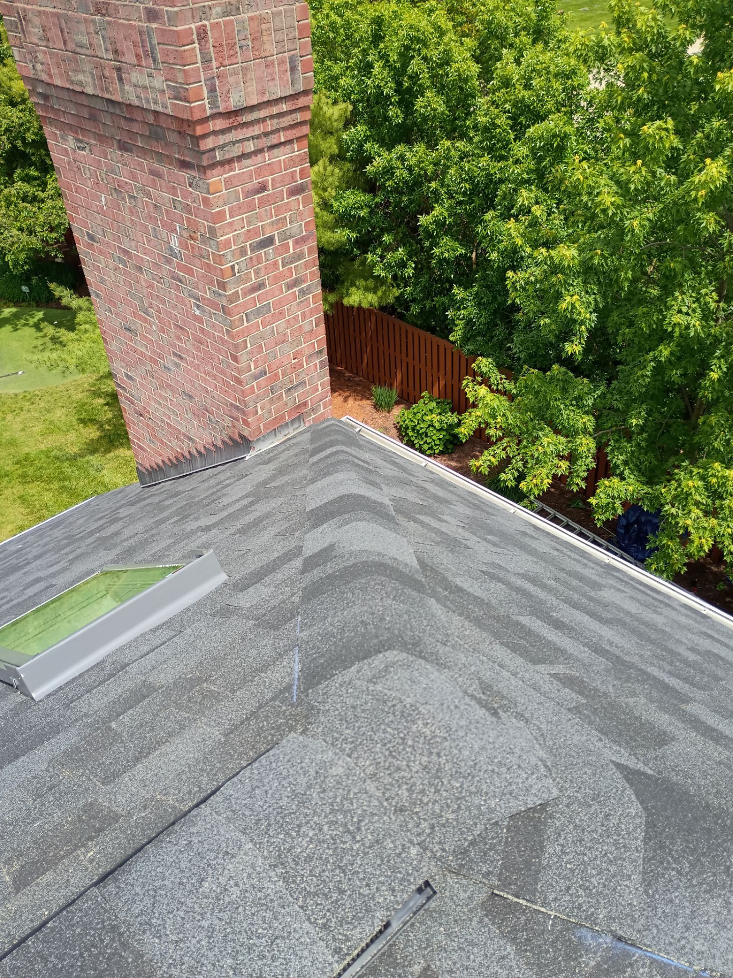 Asphalt Shingle Roof Replacement and Skylight Installation in Darien by Pro Home Services Inc