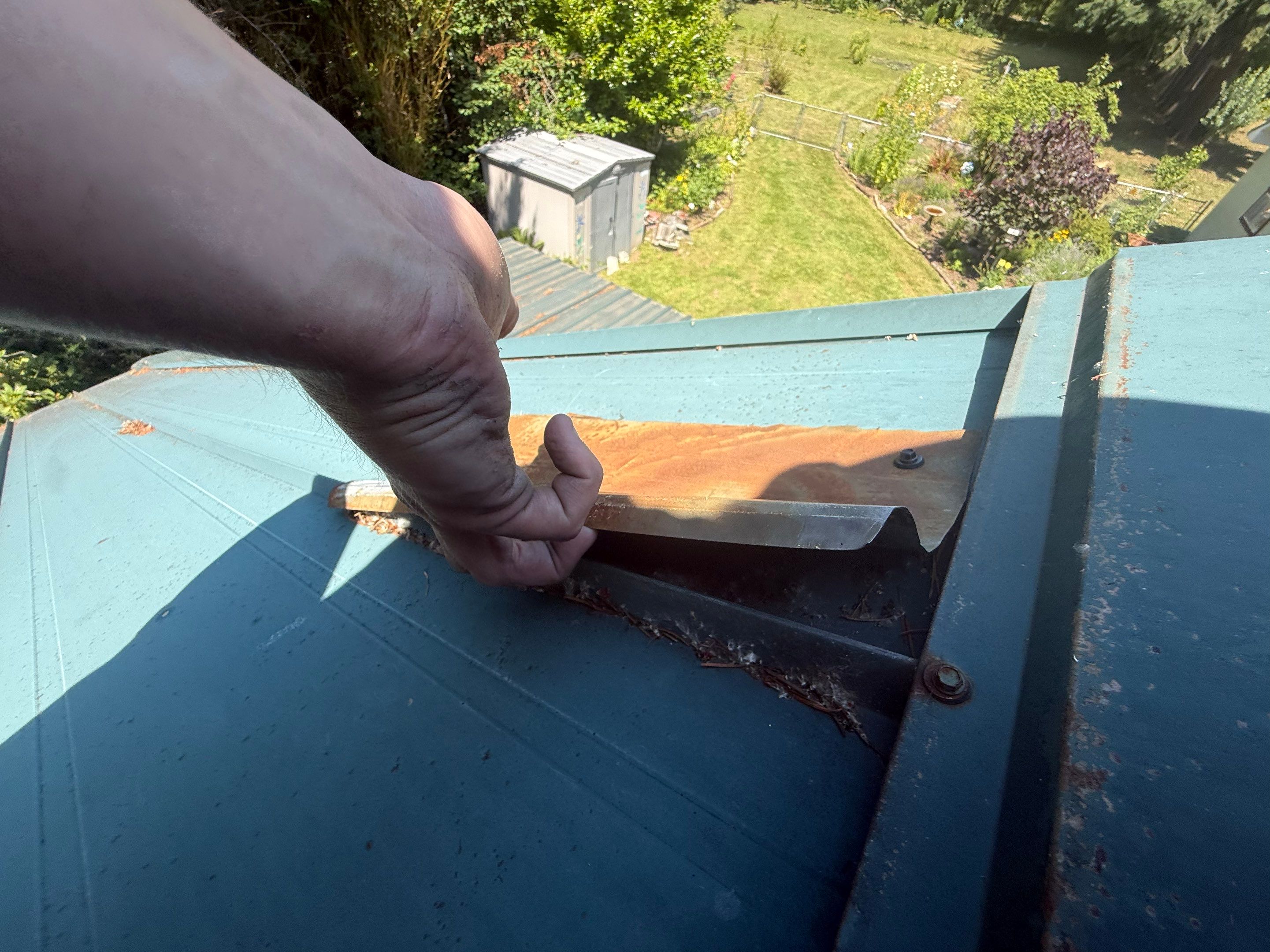 Log Cabin Metal Roof Repair and Skylight Maintenance in Springfield
