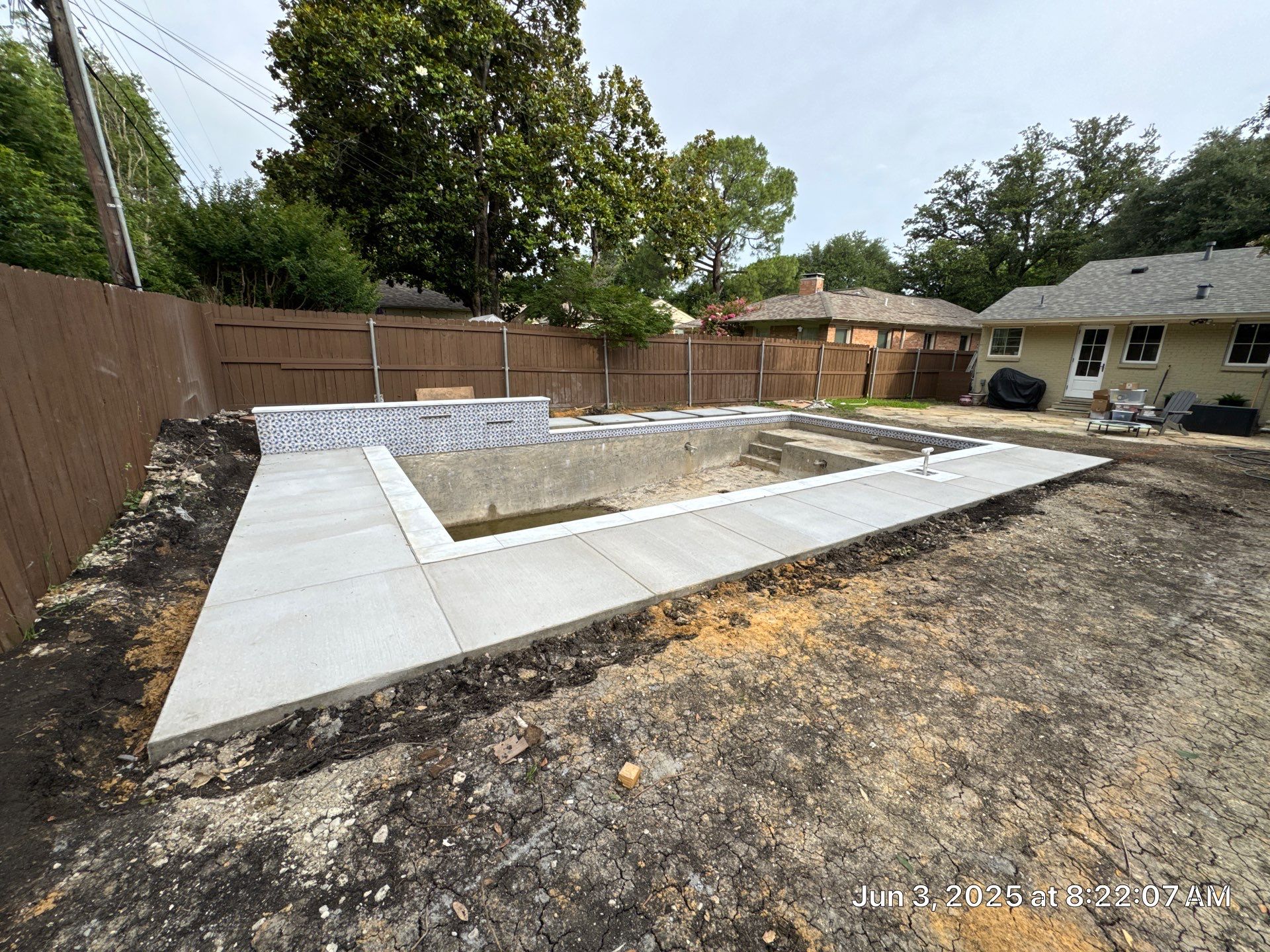 Modern Plunge Pool with Tiled Sheer-Descent Water Wall by Pinnacle Pools and Spas - DFW