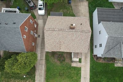 Storm Restoration - Roof Replacement using GAF Timberline HDZ Golden Harvest in Cleveland Heights