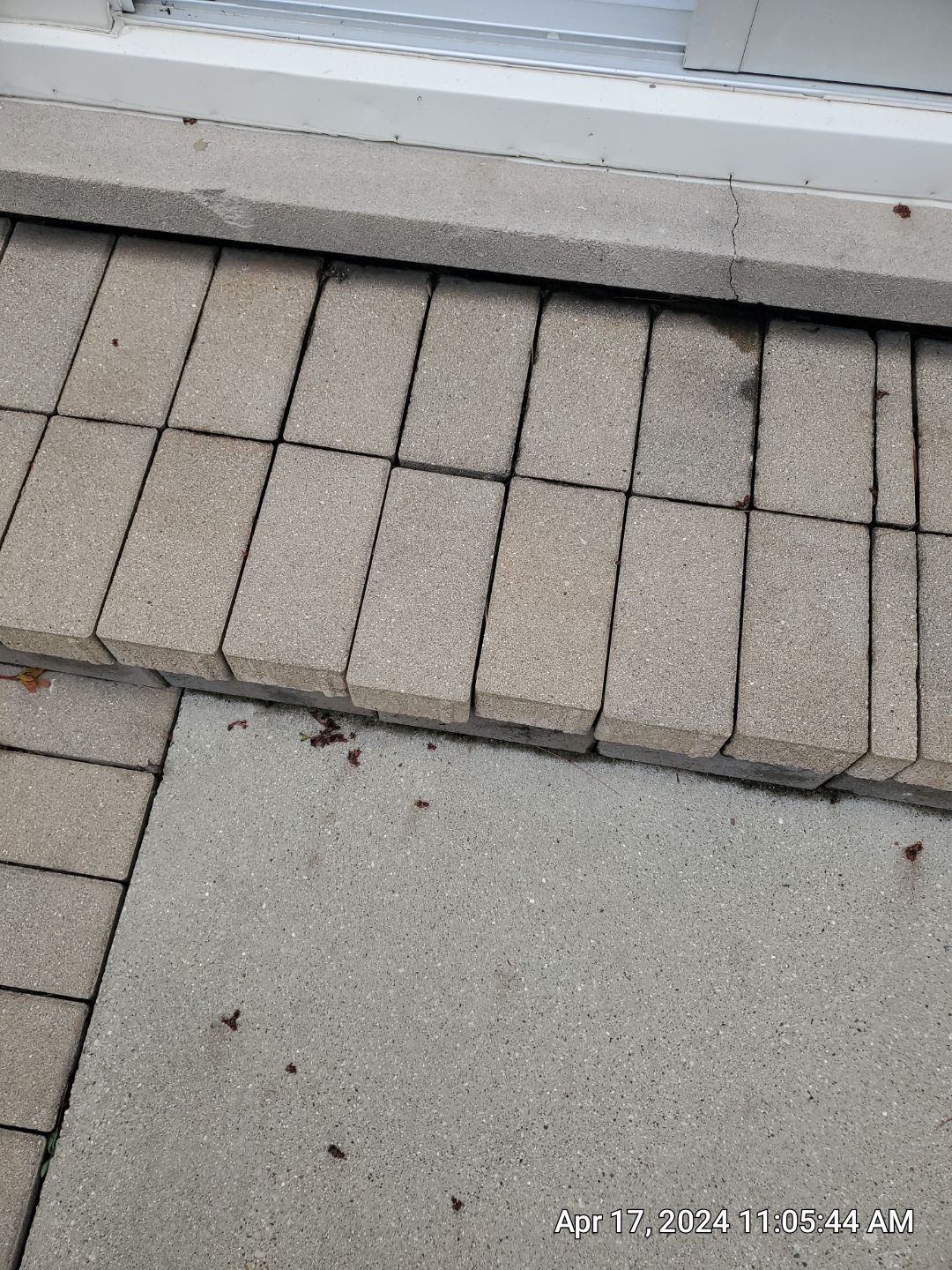 concrete patio and driveway cleaning by Northern Power Washing LLC.
