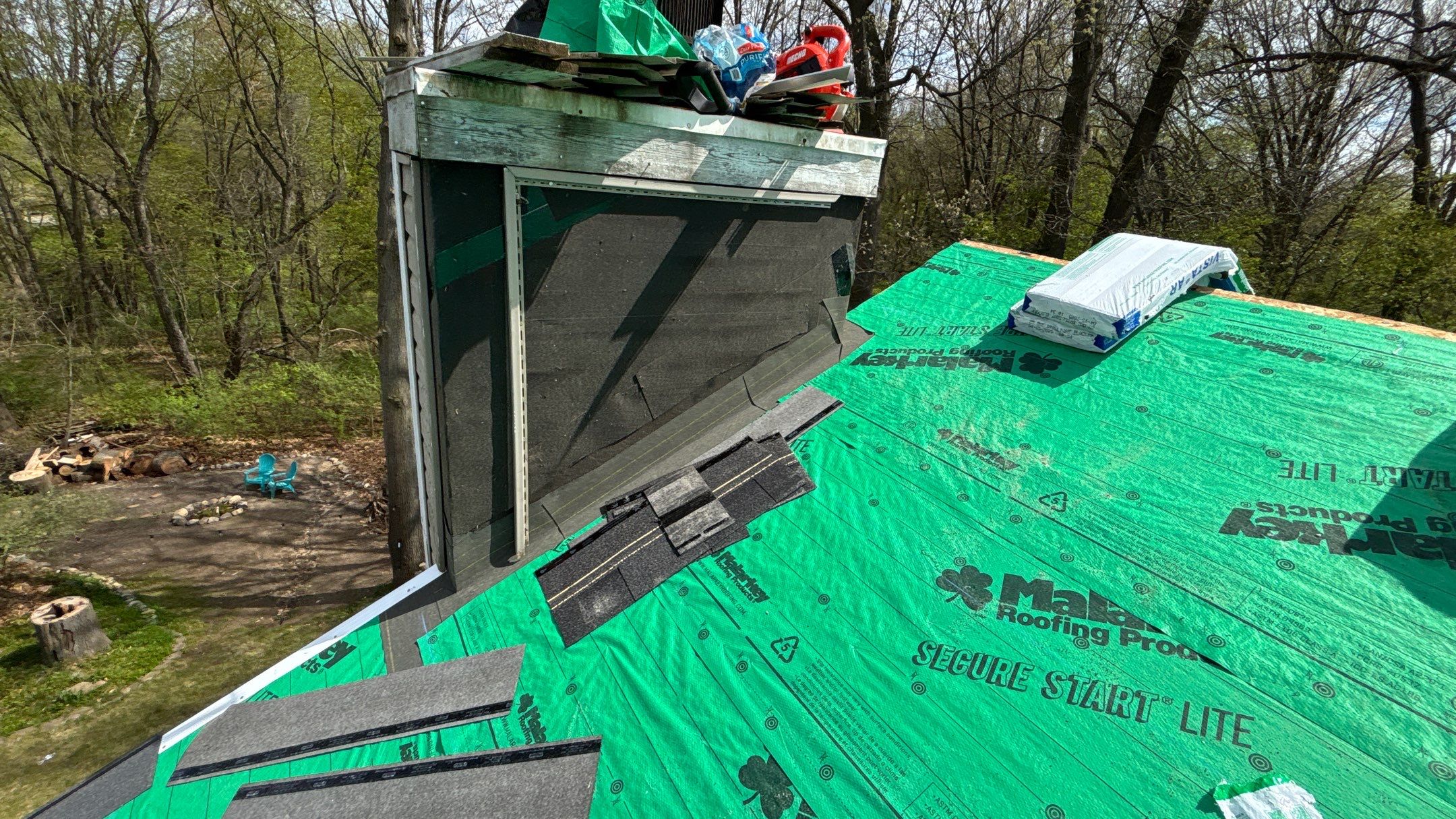 Roof Replacement using Malarkey Vista Brilliant Black by 180 Contractors