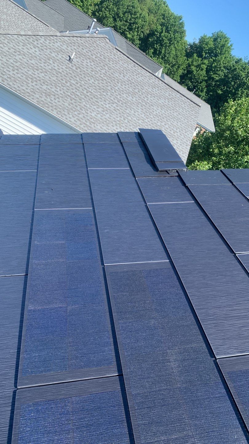 Tesla Solar Roof Replacement using Tesla Solar Roof V3 tiles by American Home Contractors