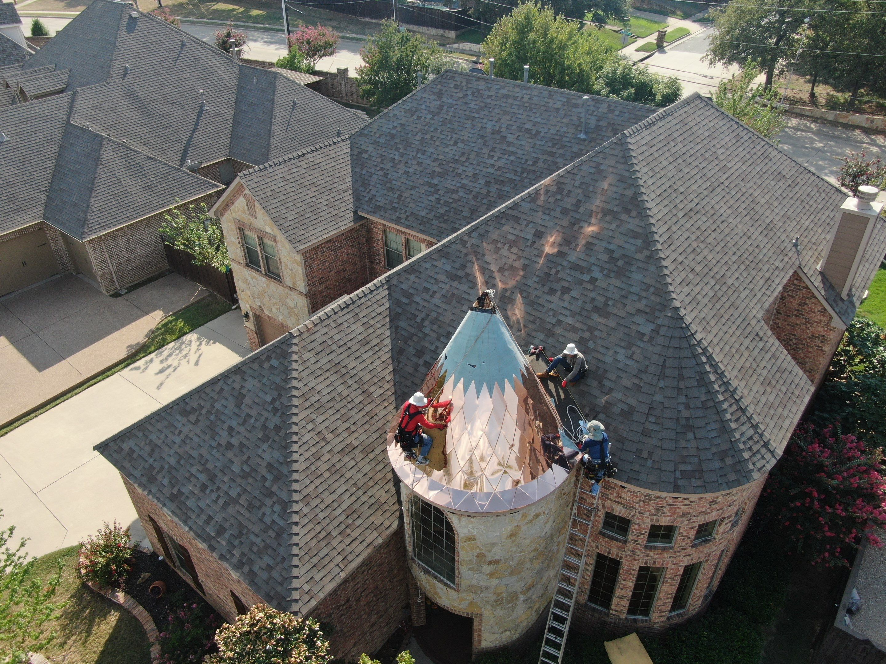 Installing Custom copper turret and Malarkey Vista Class 4 shingles Hail Damage Upgrade by Becker Roofing and Exteriors