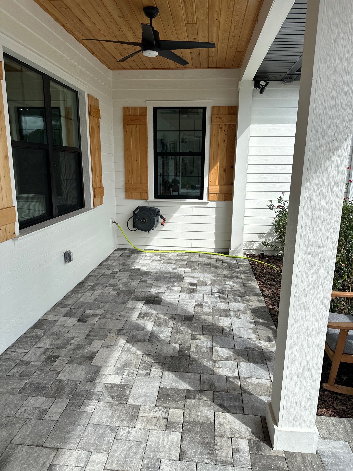 Complete Two-Story House Wash and Driveway Cleaning in Winding River Community, Bradenton, FL by Sunshine AquaWash