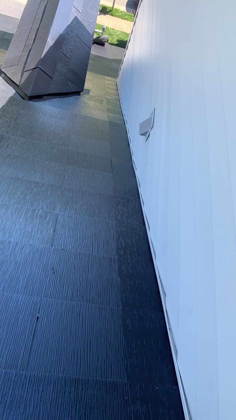 Tesla Solar Roof Replacement using Tesla Solar Roof V3 tiles by American Home Contractors
