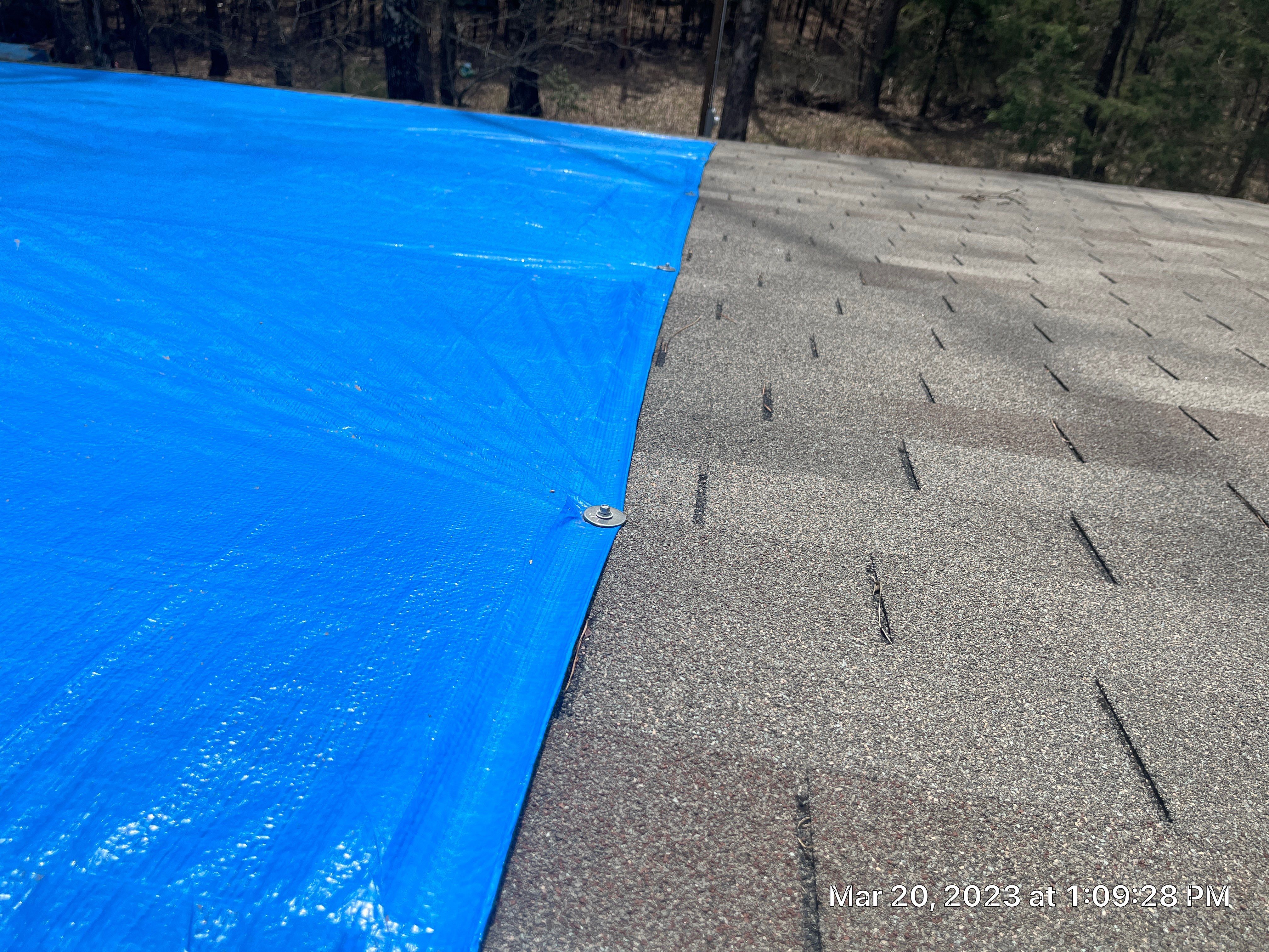 Residential Roofing Installation using 26 Gauge Colored Panels by Hostetler Roofing