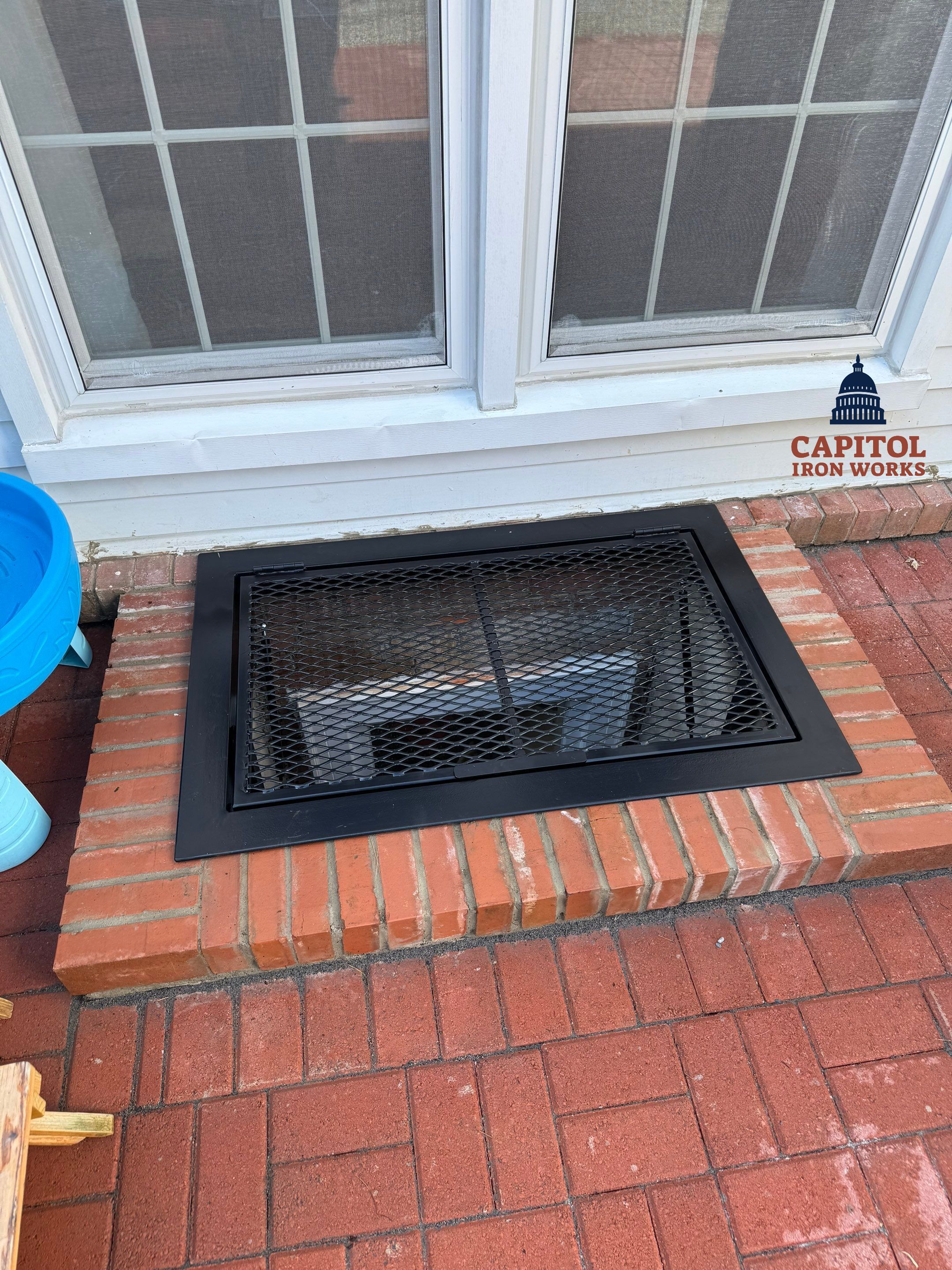 Custom Iron Window Well Cover with Lift System – Residential – Montgomery Village, MD by Capitol Iron Works