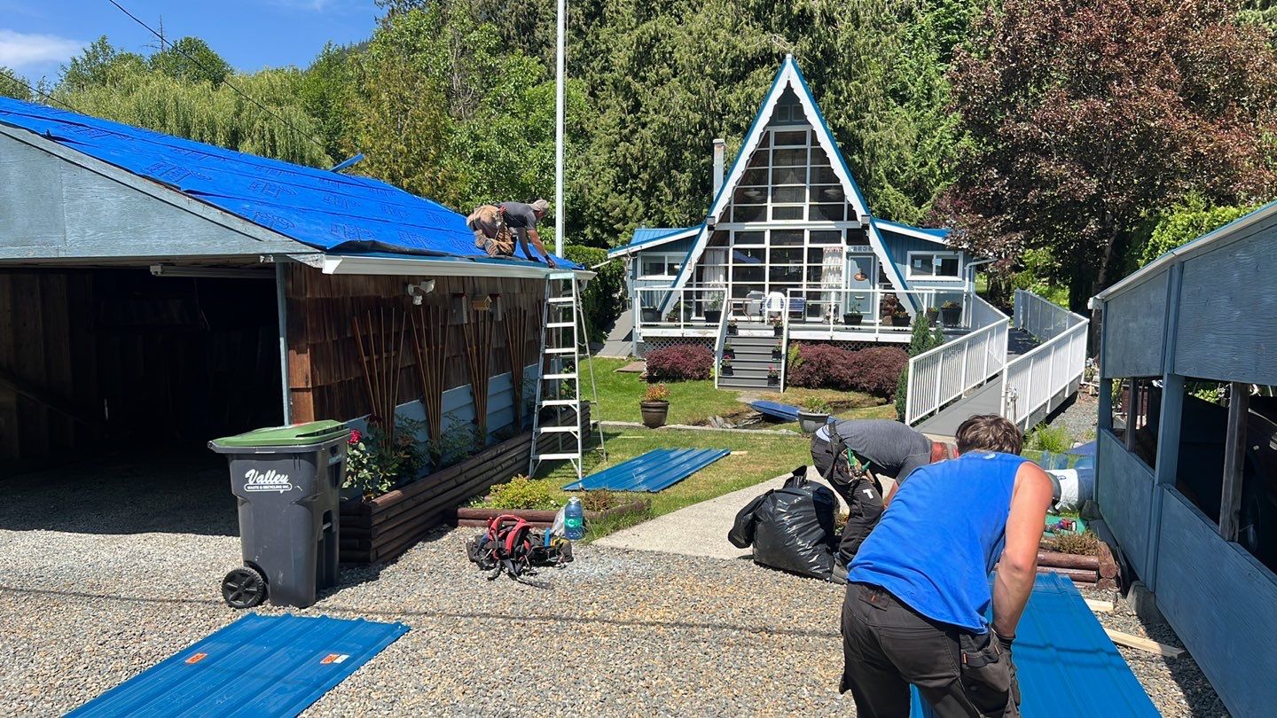 Residential ReRoofing Installation using Duraclad 26ga by Top Notch Roofing Inc