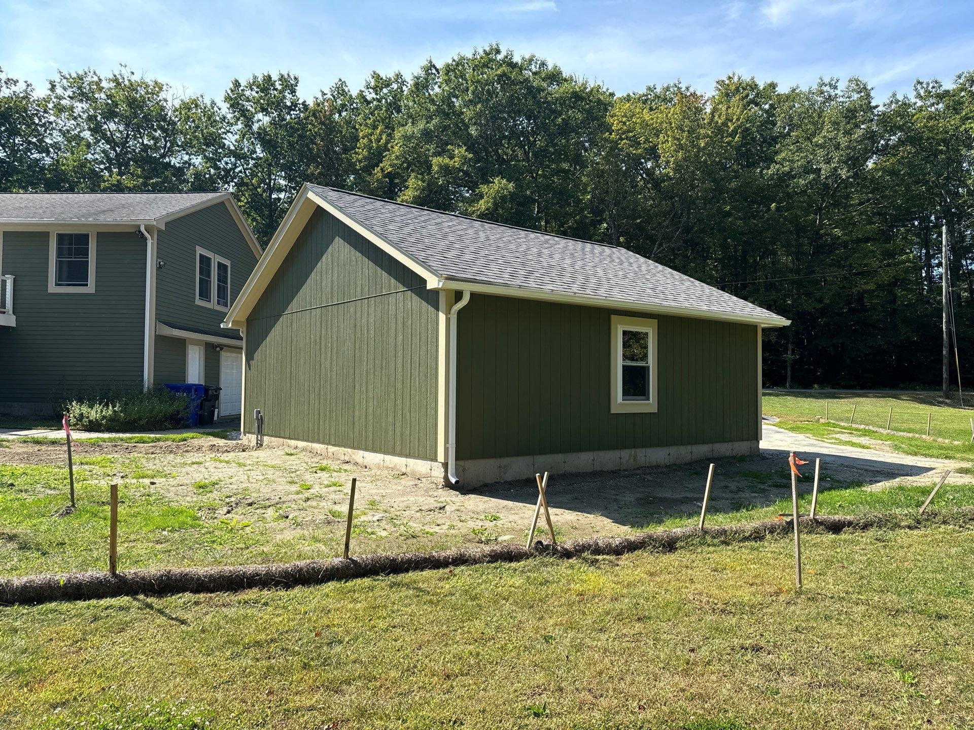 Two-Car Garage using LP SmartSide Panel Siding by Chagnon Building & Remodeling LLC