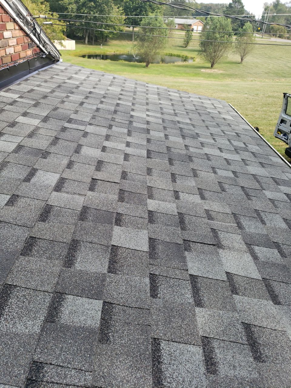 Brand: Atlas Pinnacle Color: Pristine Scotchgard Coastal Granite Drip: White by Eagle Eye Roofing