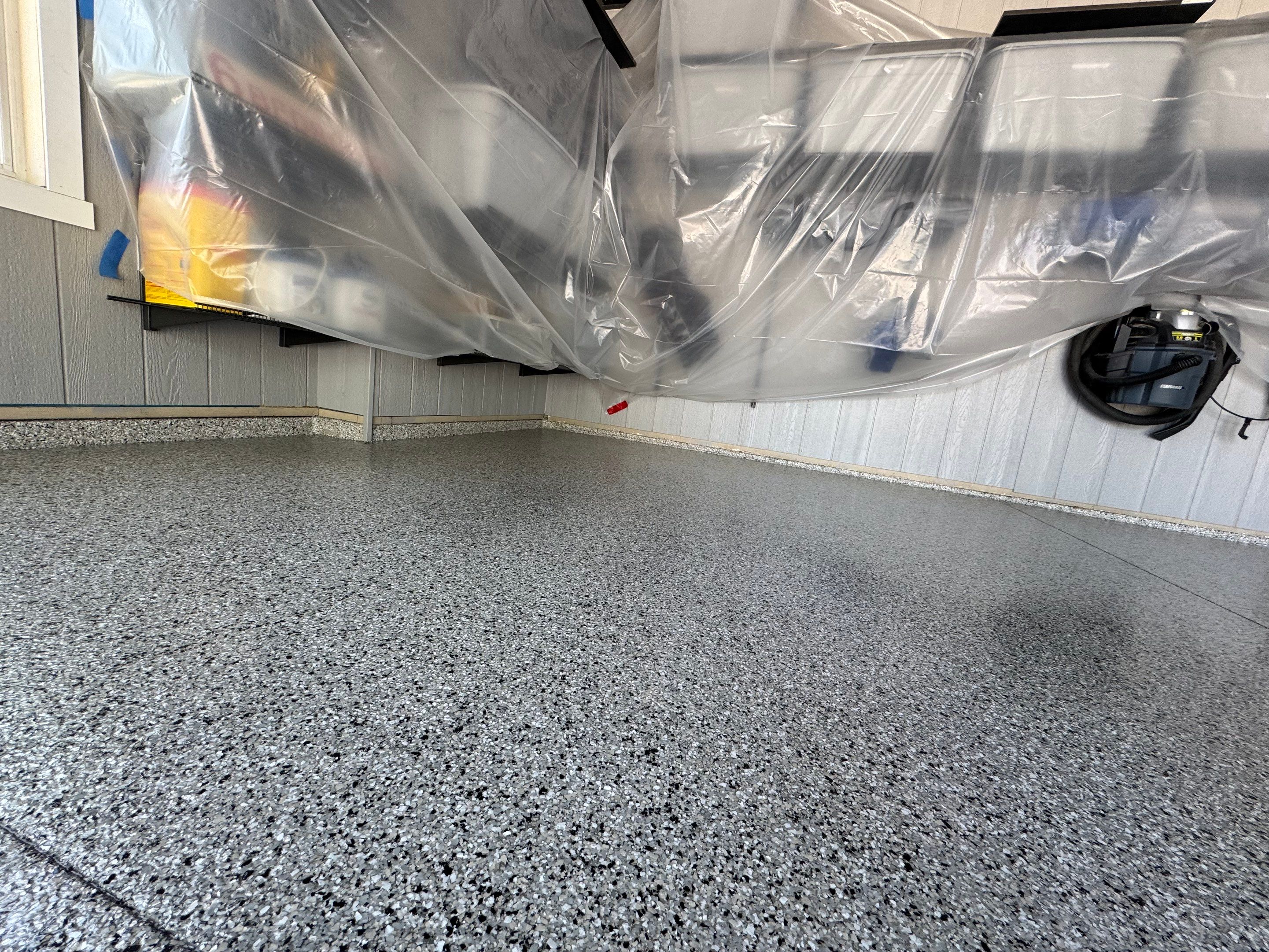 High-Gloss Grey Epoxy Floor Coating for Inwood Garage by Select Painting, Coatings & Garage Cabinets