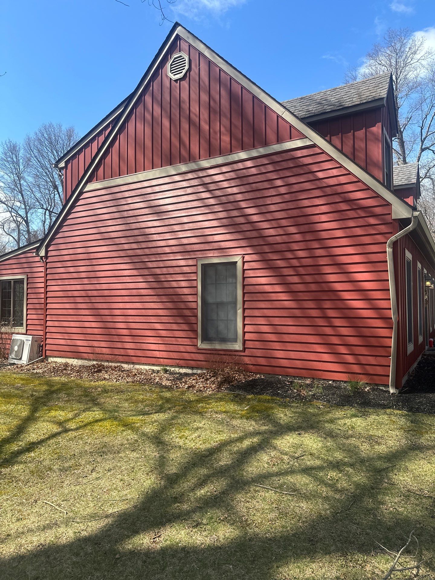 Red Siding in Beaver Dam NY by roberts roofing