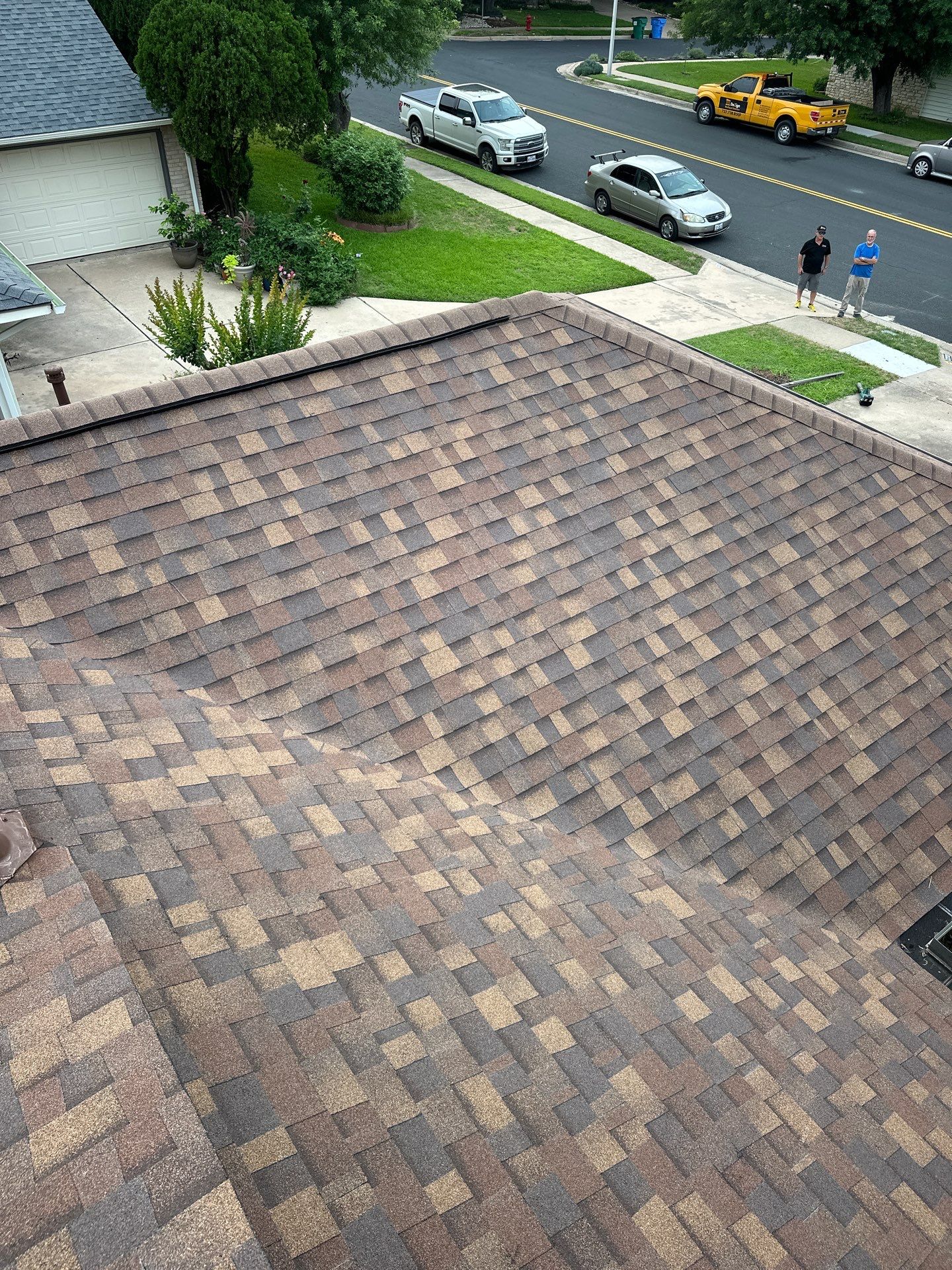 Residential Roofing Installation using Owens Corning TruDef Desert Rose by DeZign Roofing & Exteriors
