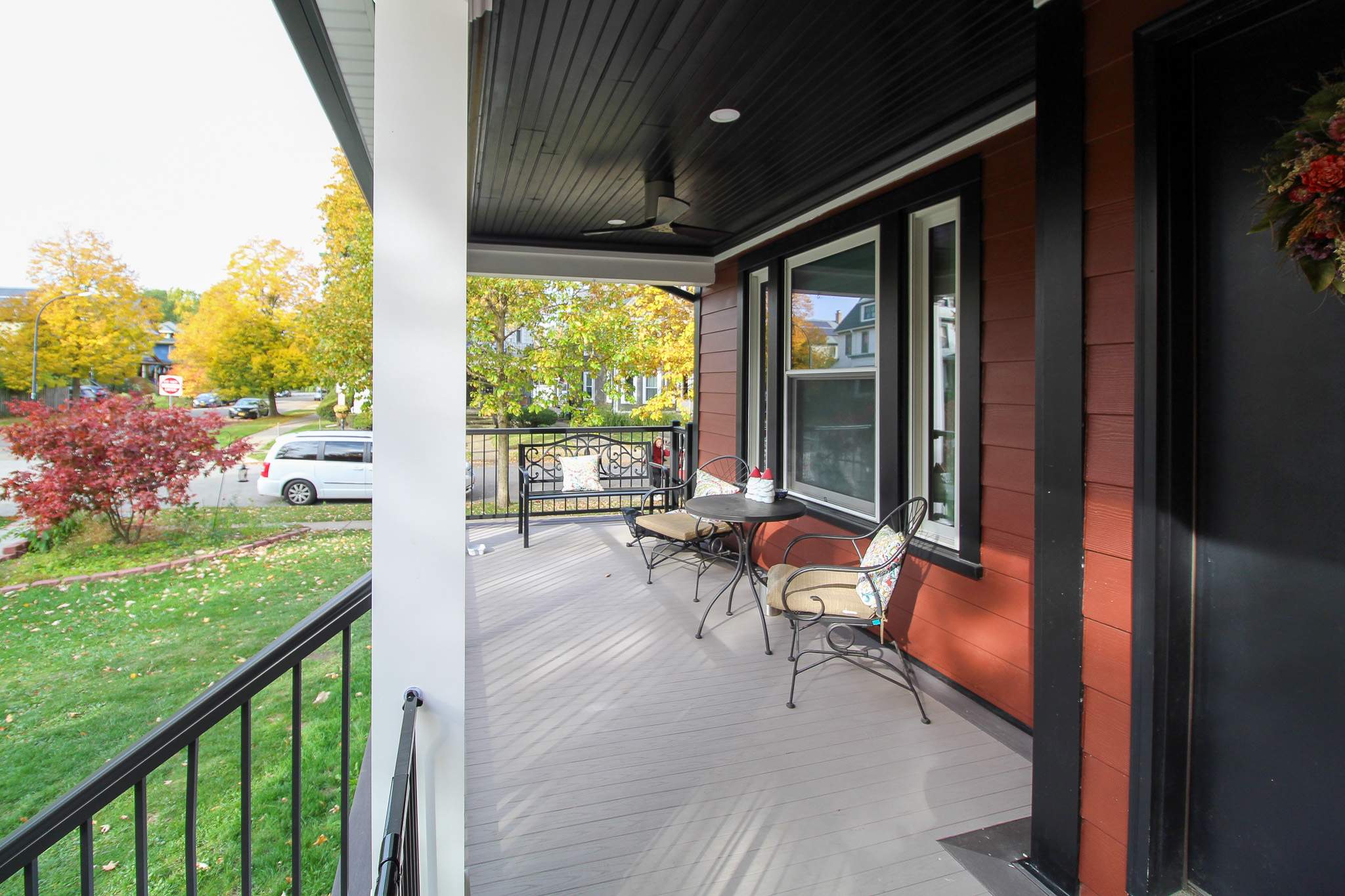 Exterior Renovations- Siding, Stamped Concrete, Porch, and Railings by Ivy Lea Construction