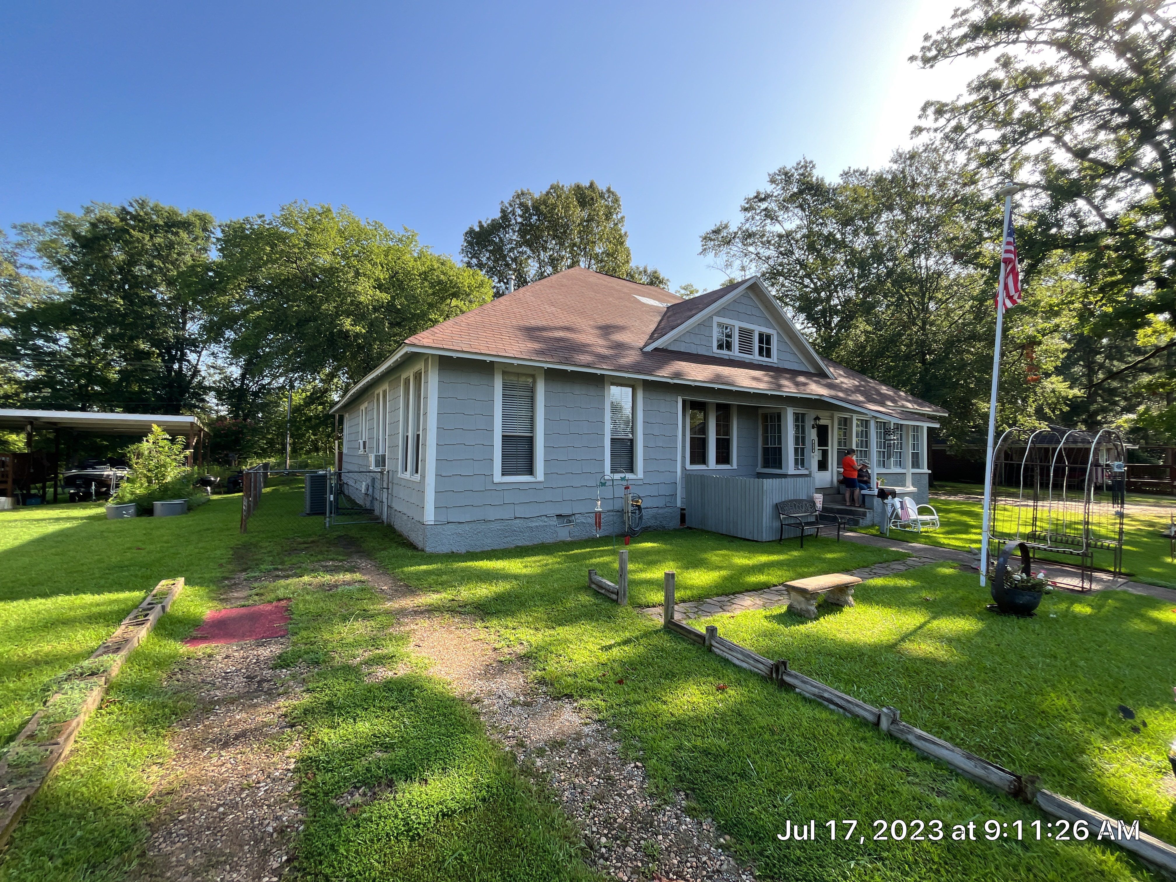 Residential Metal Roof Replacement using Reed's Metals: Colored Residental Panel (Burgundy) by Hostetler Roofing
