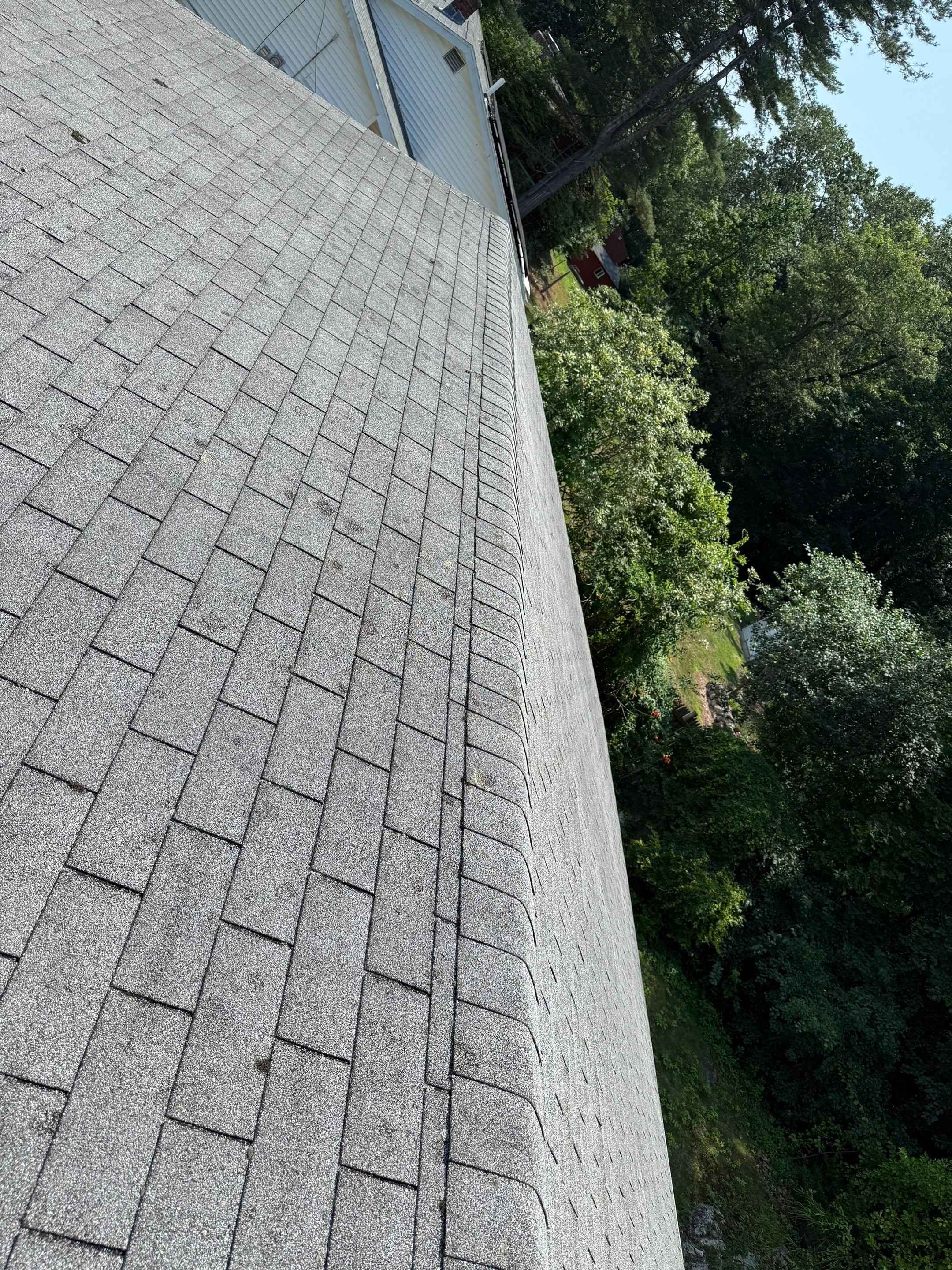 Onyx Black Roof Transformation in Maynard, MA by Mighty Dog Roofing of Greater Middlesex County
