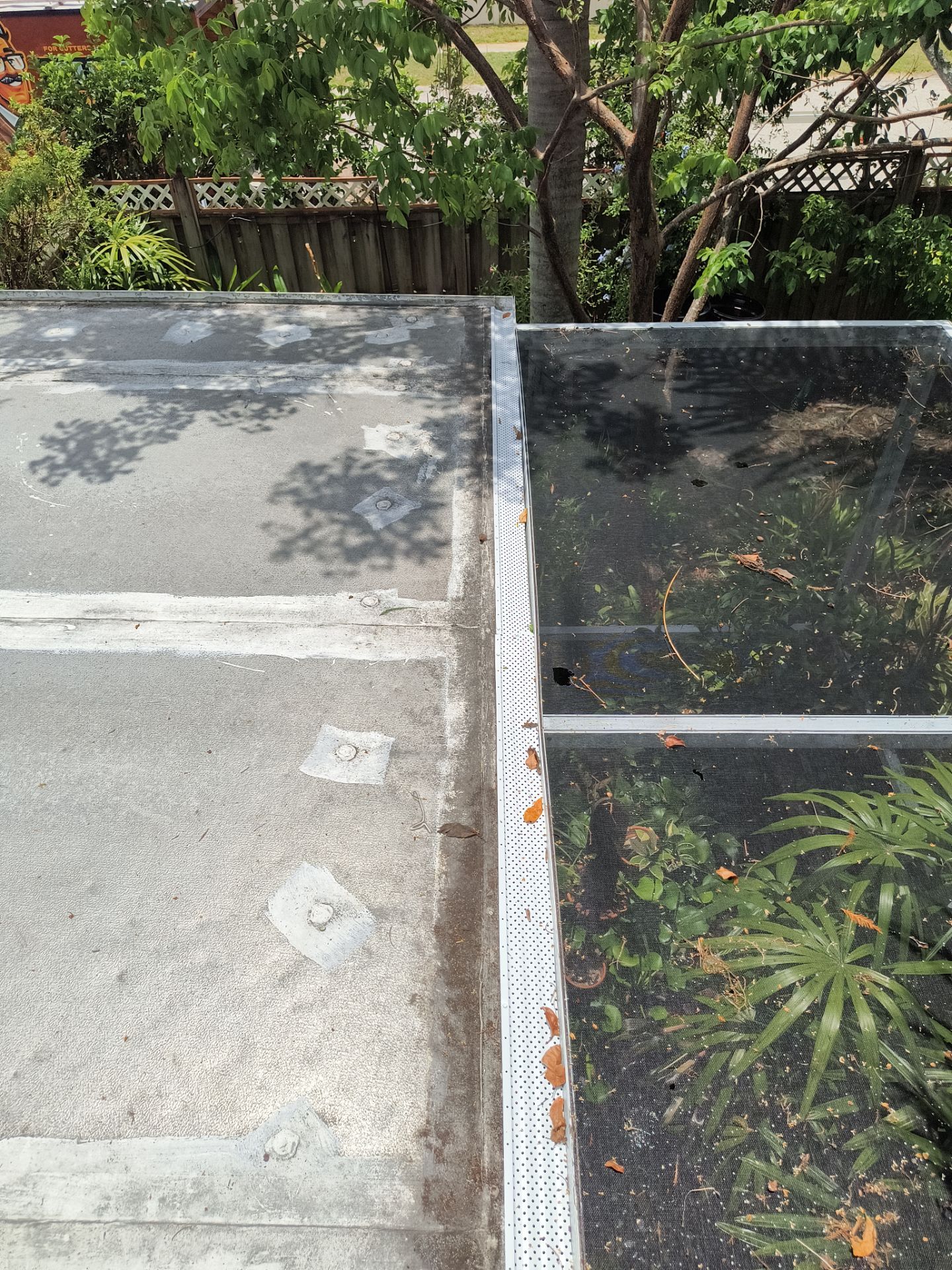 White 6-Inch Seamless Gutters in Sarasota FL by Gutter Professors